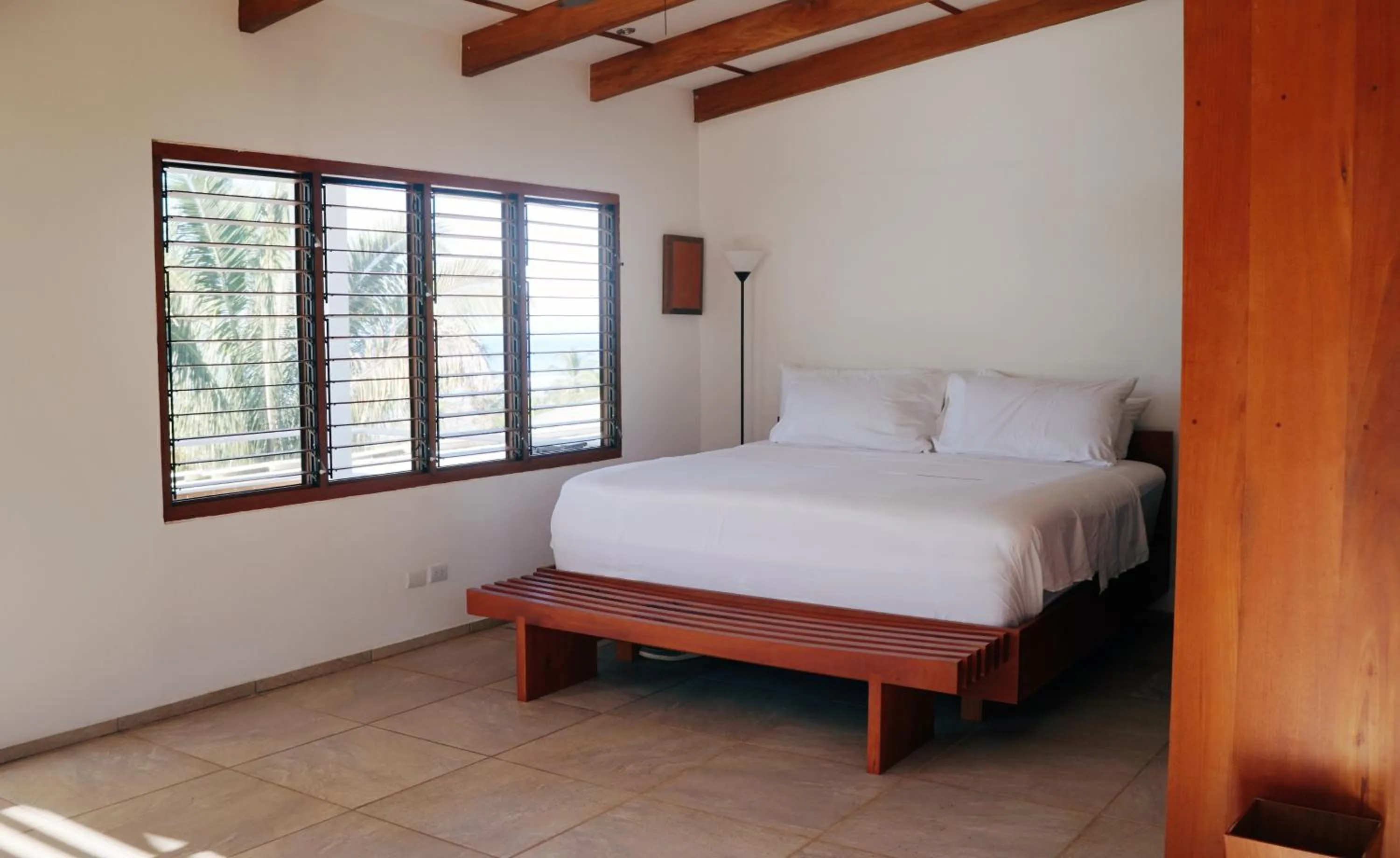 Bedroom in Salvatierra Beachfront Hotel