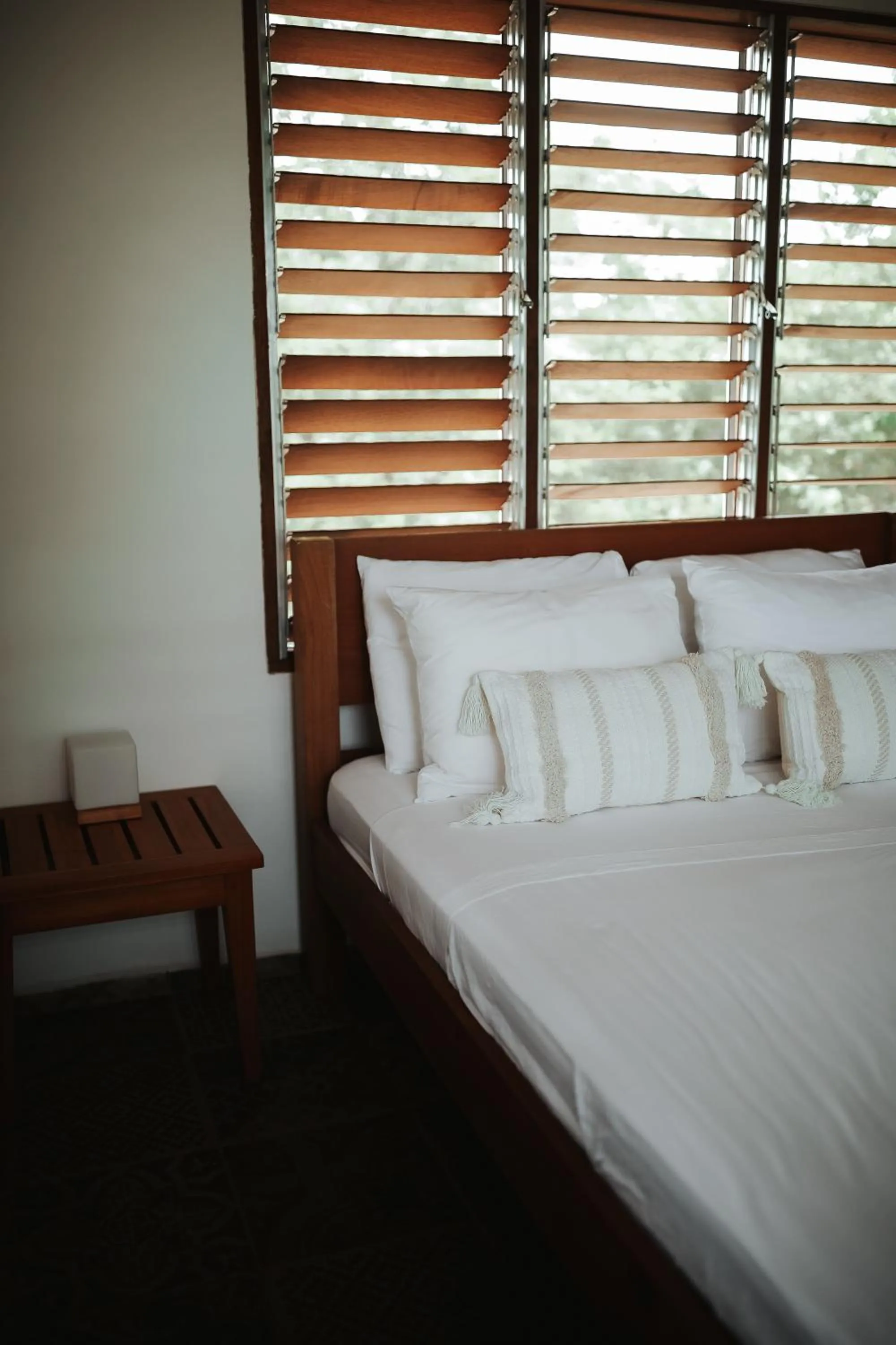 Bed in Salvatierra Beachfront Hotel