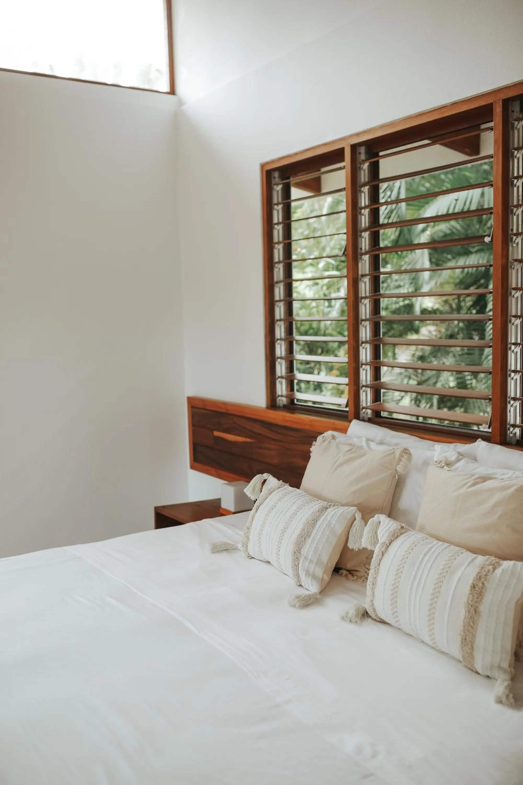 Bed in Salvatierra Beachfront Hotel