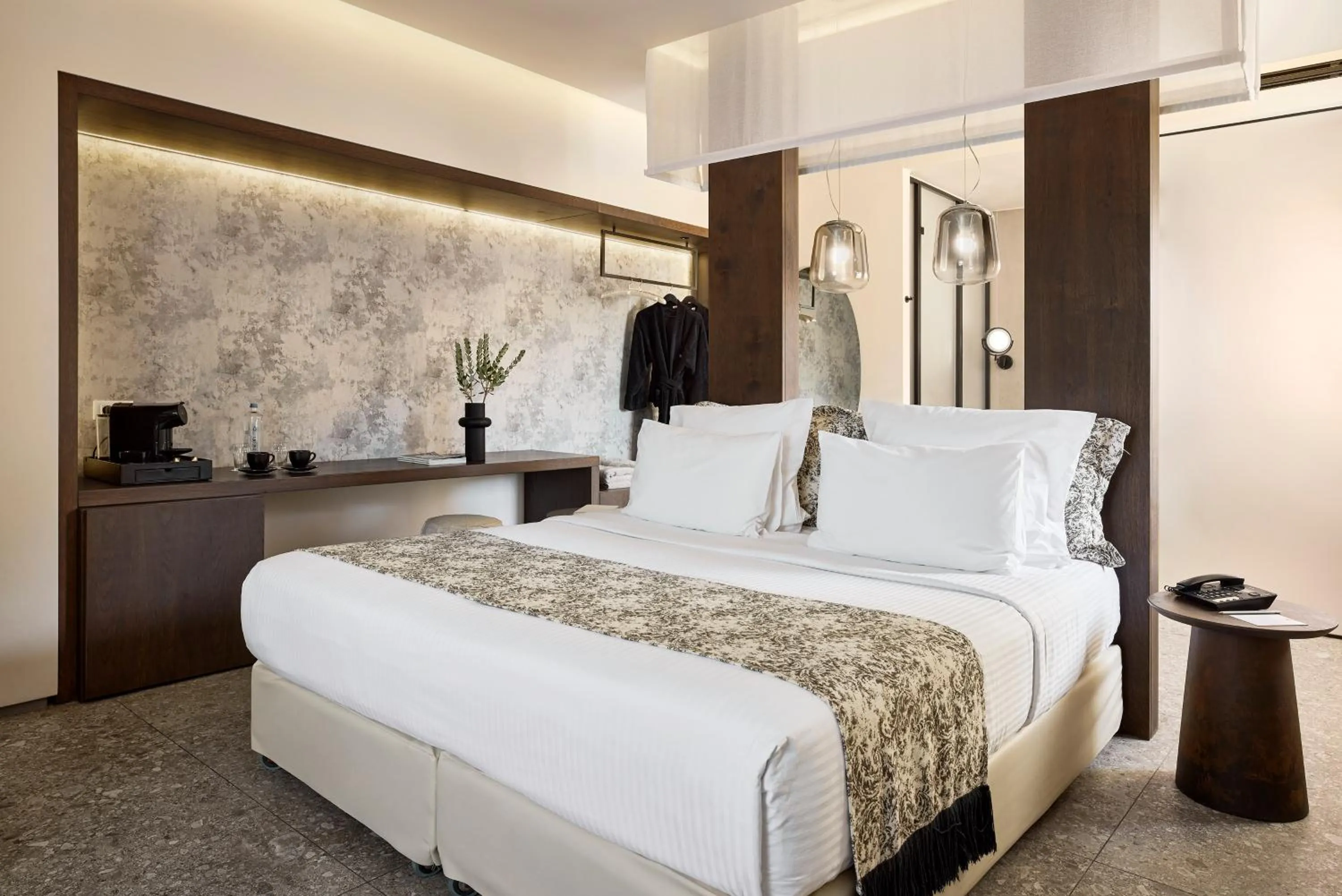 Bed in Amazon Mykonos Suites & Spa