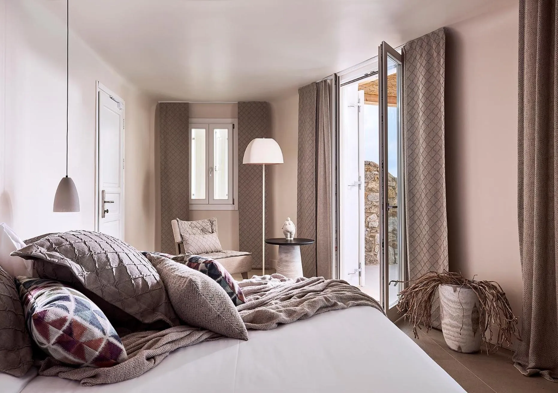 Bed in Amazon Mykonos Suites & Spa