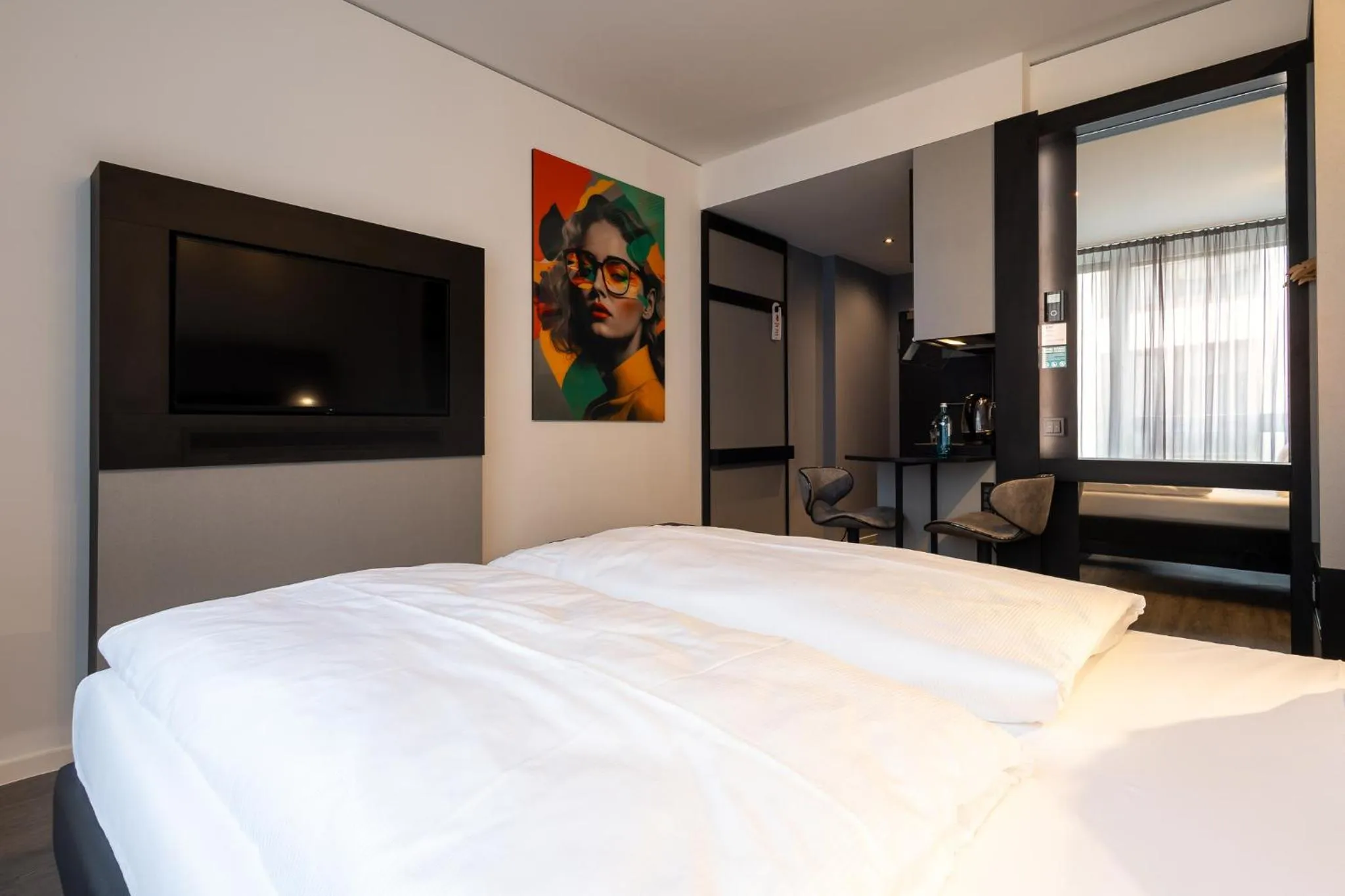 Photo of the whole room, Bed in GINN Apartment-Hotel Stuttgart-Esslingen