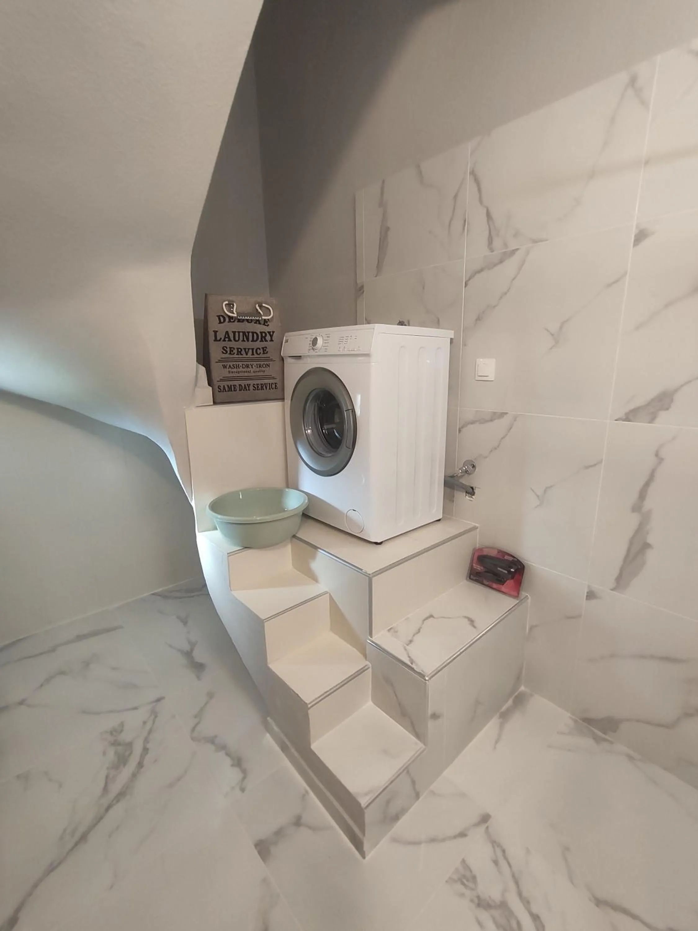 washing machine in Kashmir Luxury Apartments