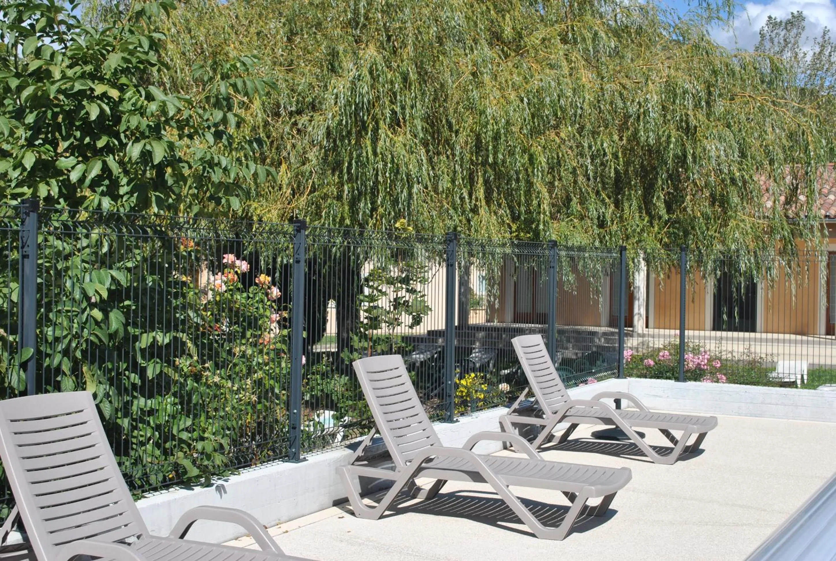 Swimming pool in Le Hameau des Sources by Ateya