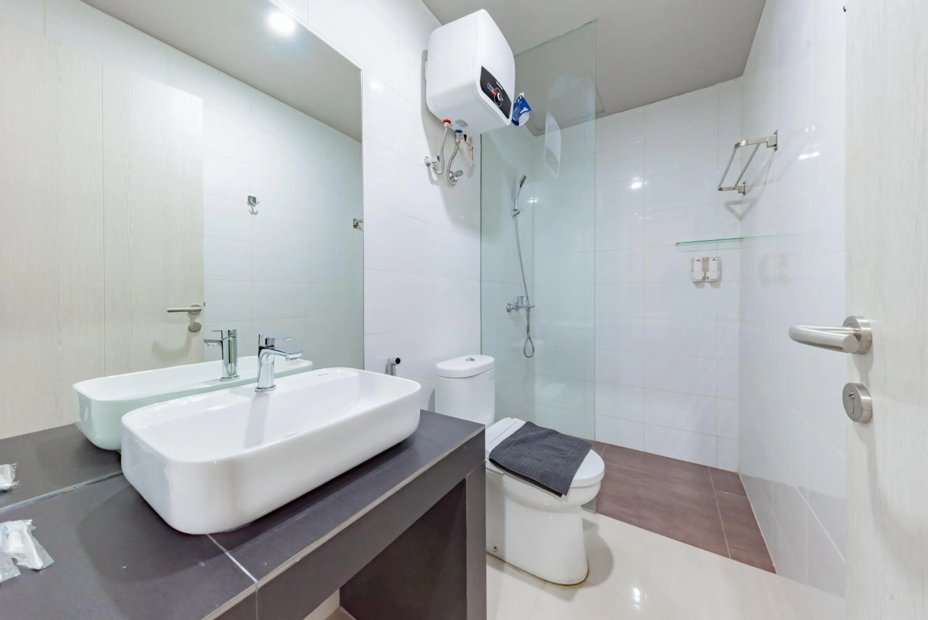 Bathroom in Sans Hotel Berau Square