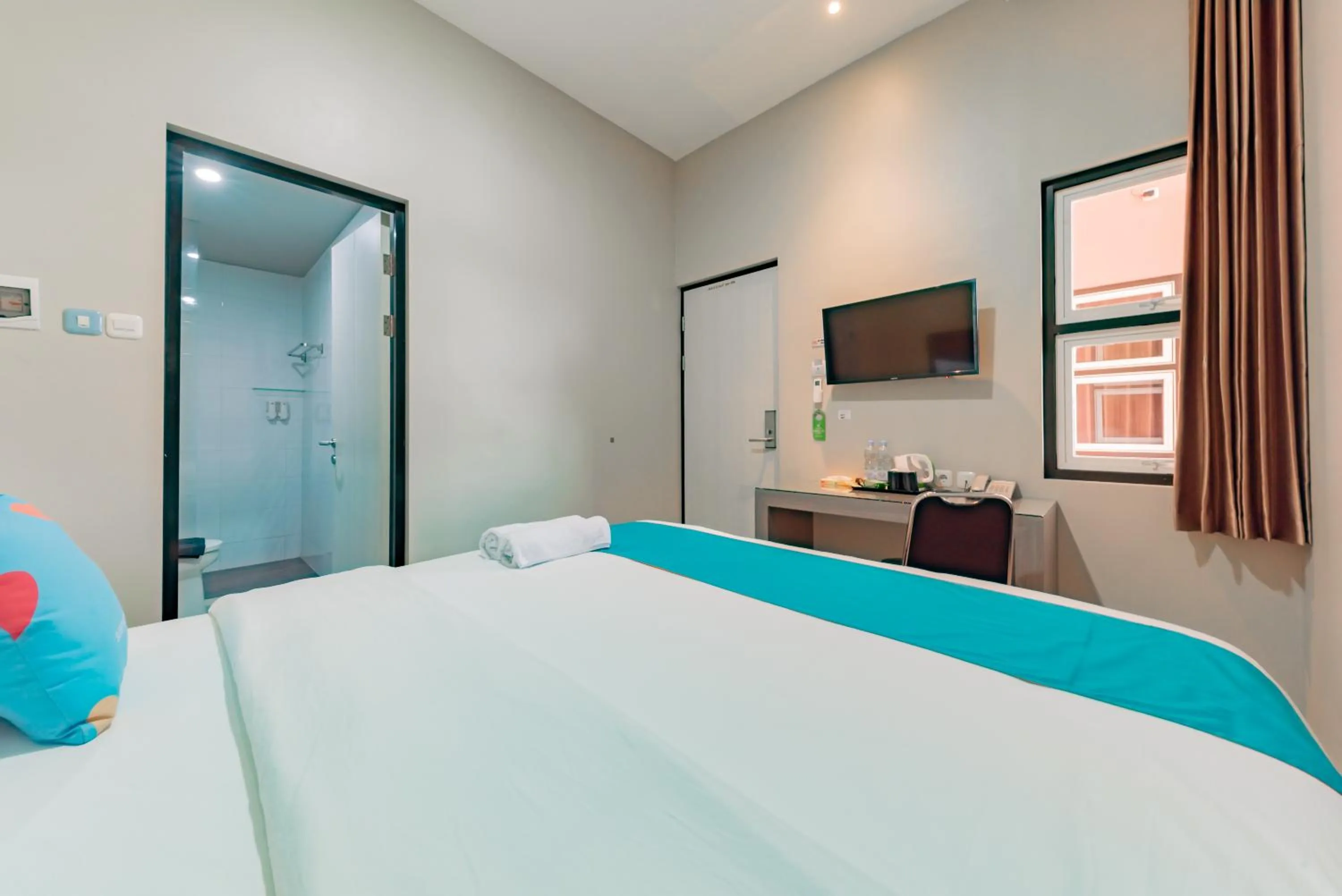 Bedroom, Bed in Sans Hotel Berau Square