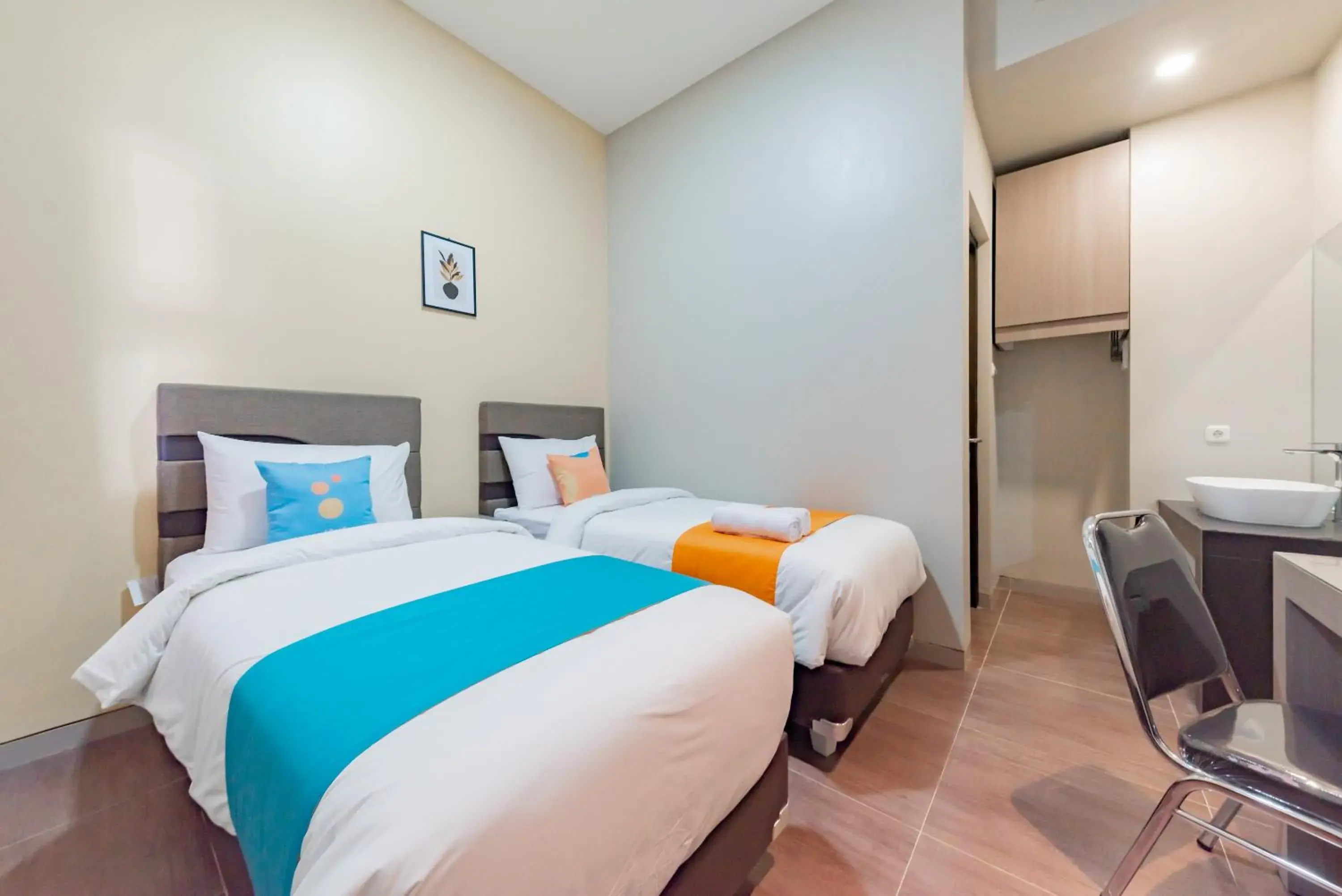 Deluxe Twin Room in Sans Hotel Berau Square Deluxe Twin Room in Sans Hotel Berau Square