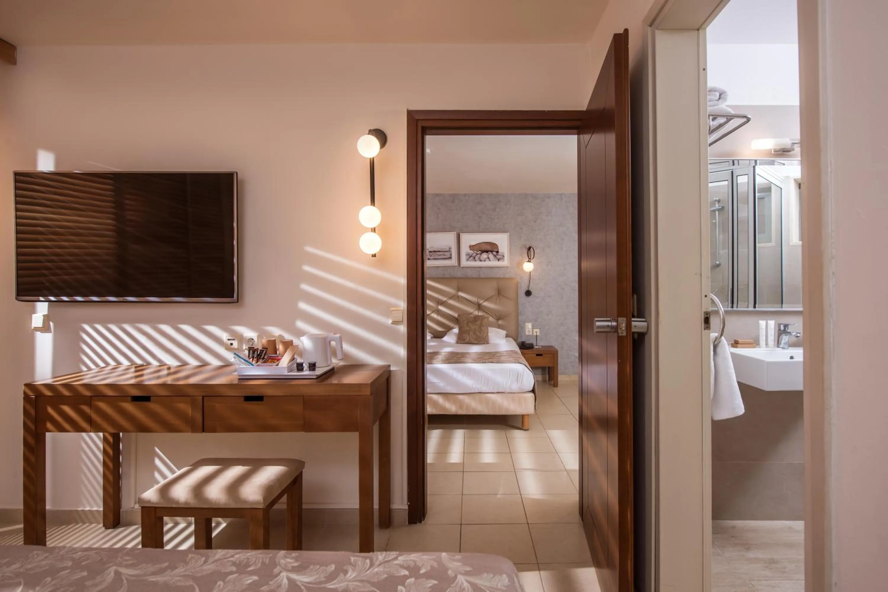 Bathroom, Bed in Bella Beach Hotel