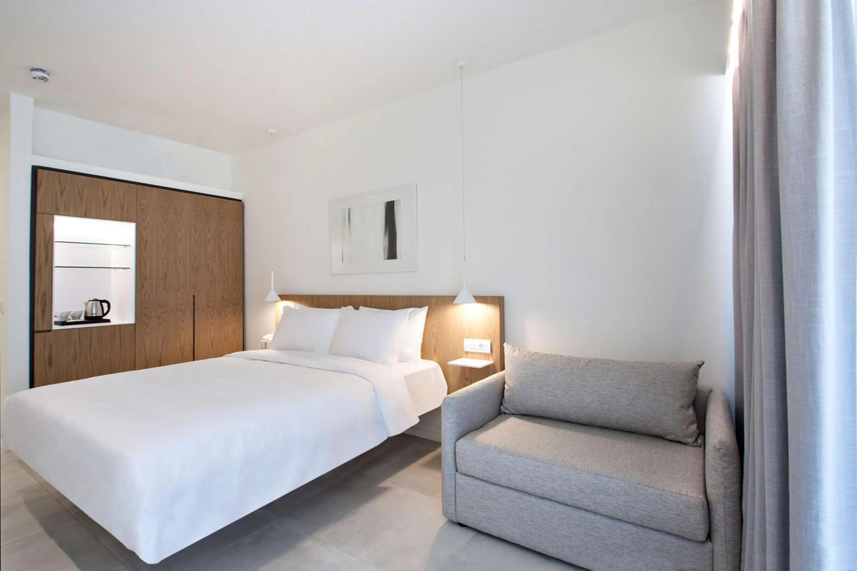 Bedroom, Bed in Radisson Resort Plaza Skiathos