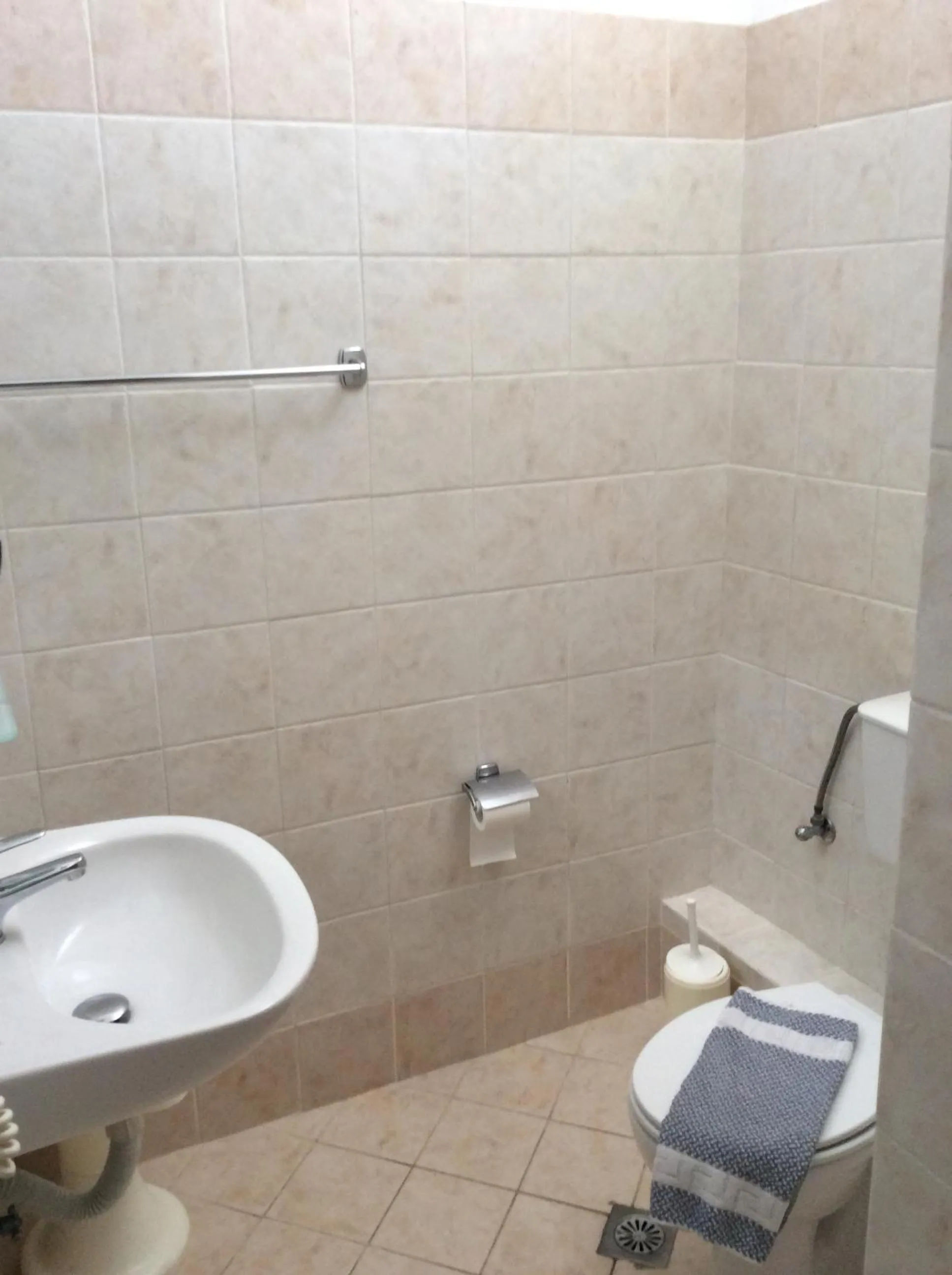 Toilet in Rozos Hotel