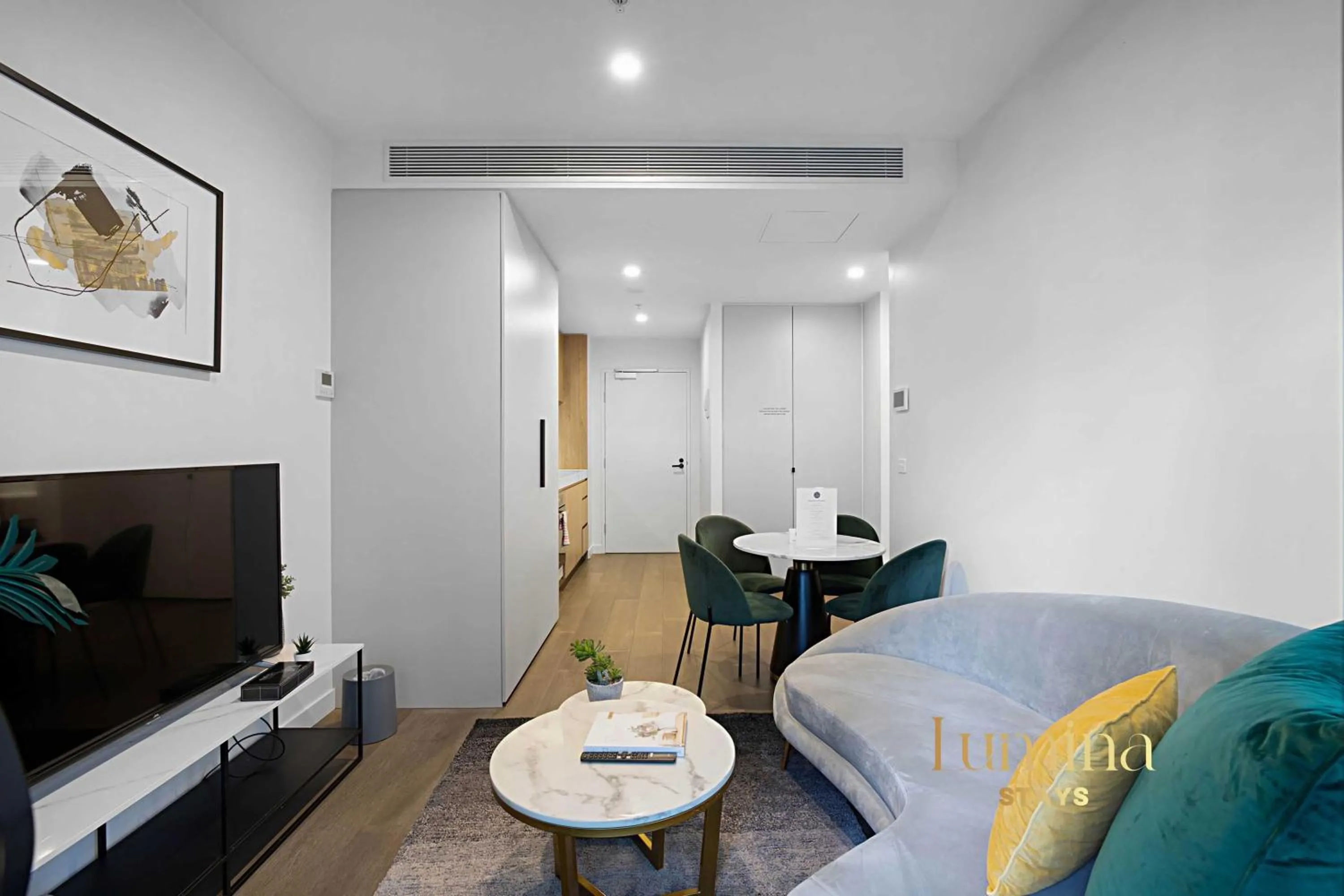 Living room, Bed in Lumina Suites