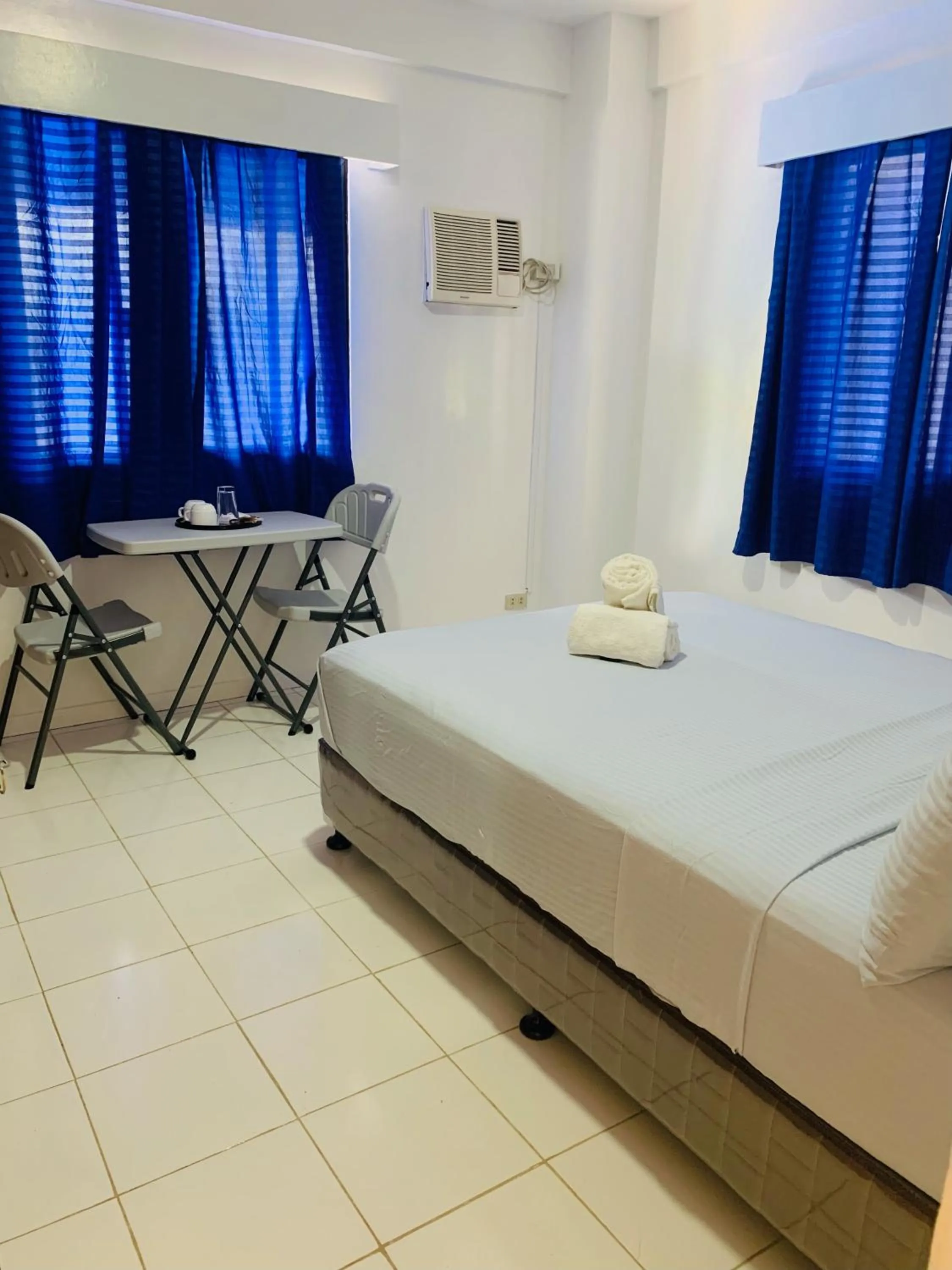 Bed in The Victorian by Stevrena Accommodations