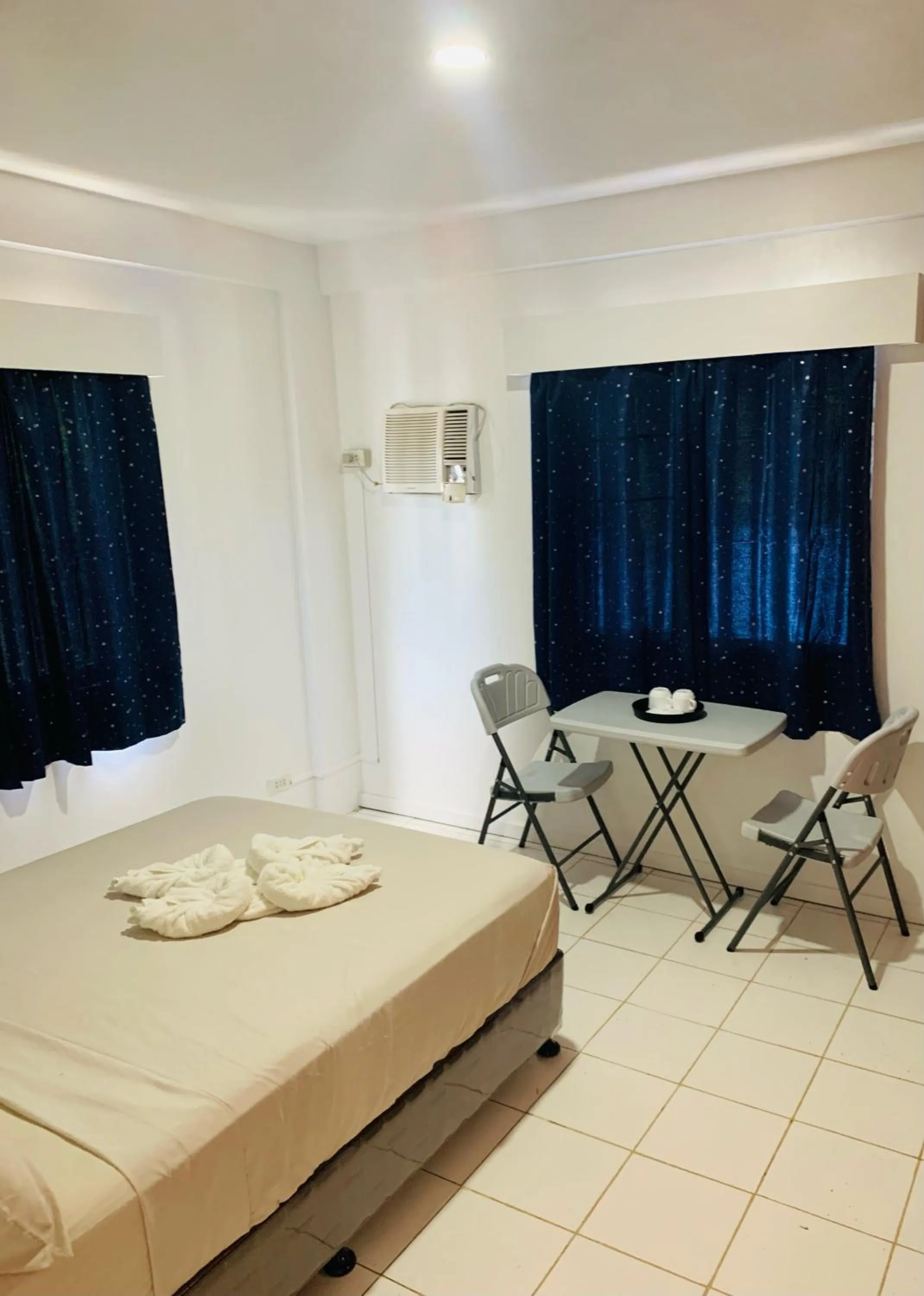 Bed in The Victorian by Stevrena Accommodations