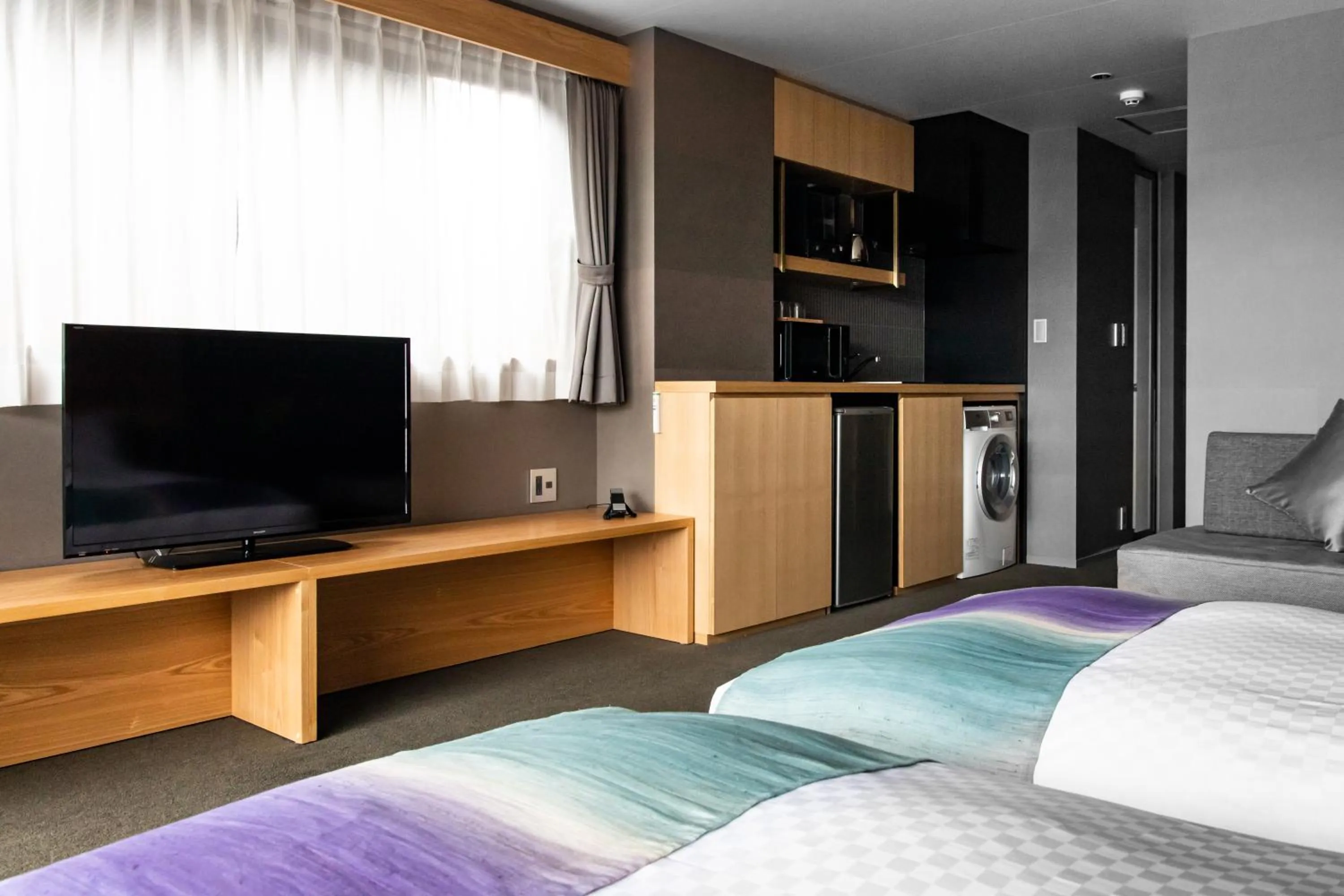 Bed, TV/Entertainment Center in THE MACHIYA SHINSEN-EN