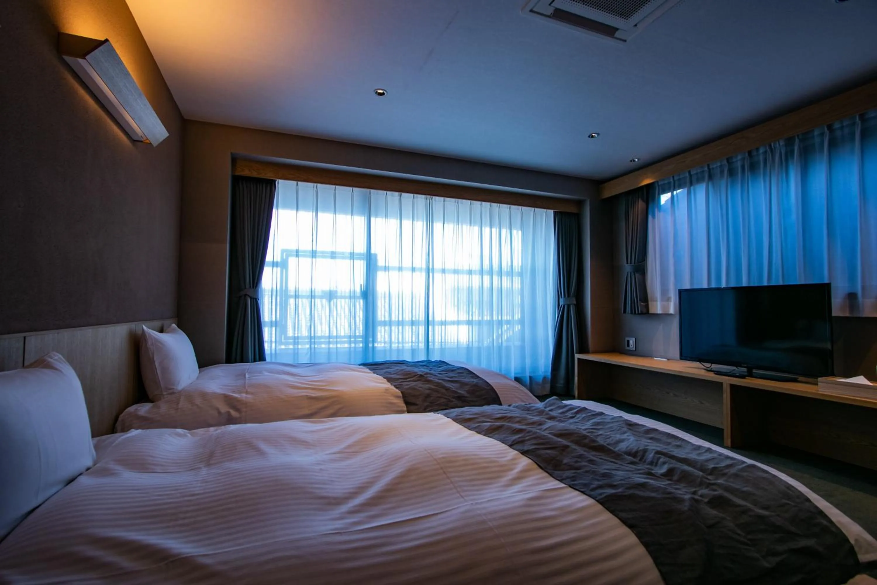 Bed in THE MACHIYA SHINSEN-EN