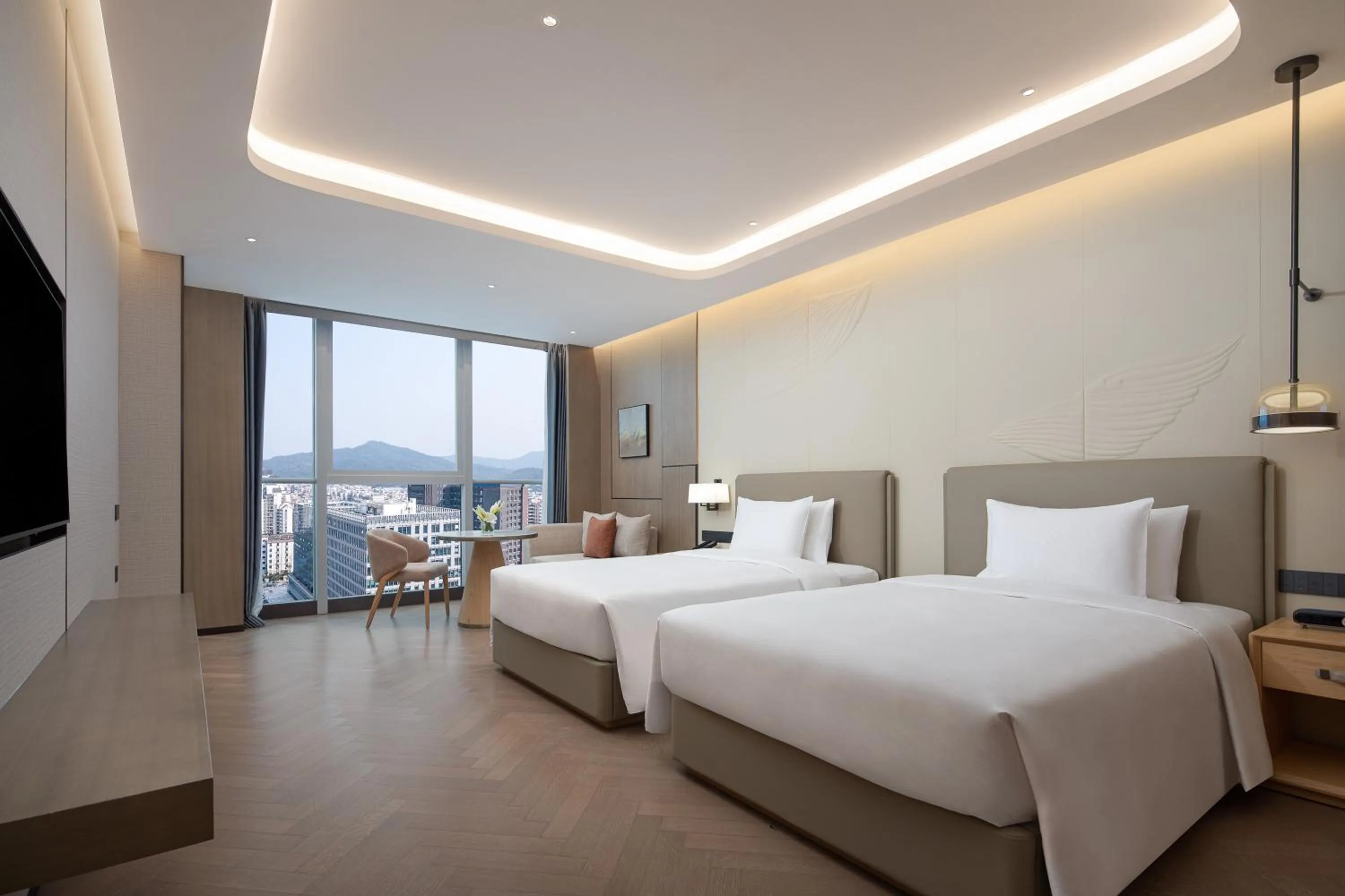 Bed in Wyndham Guangzhou Baiyun Mountain