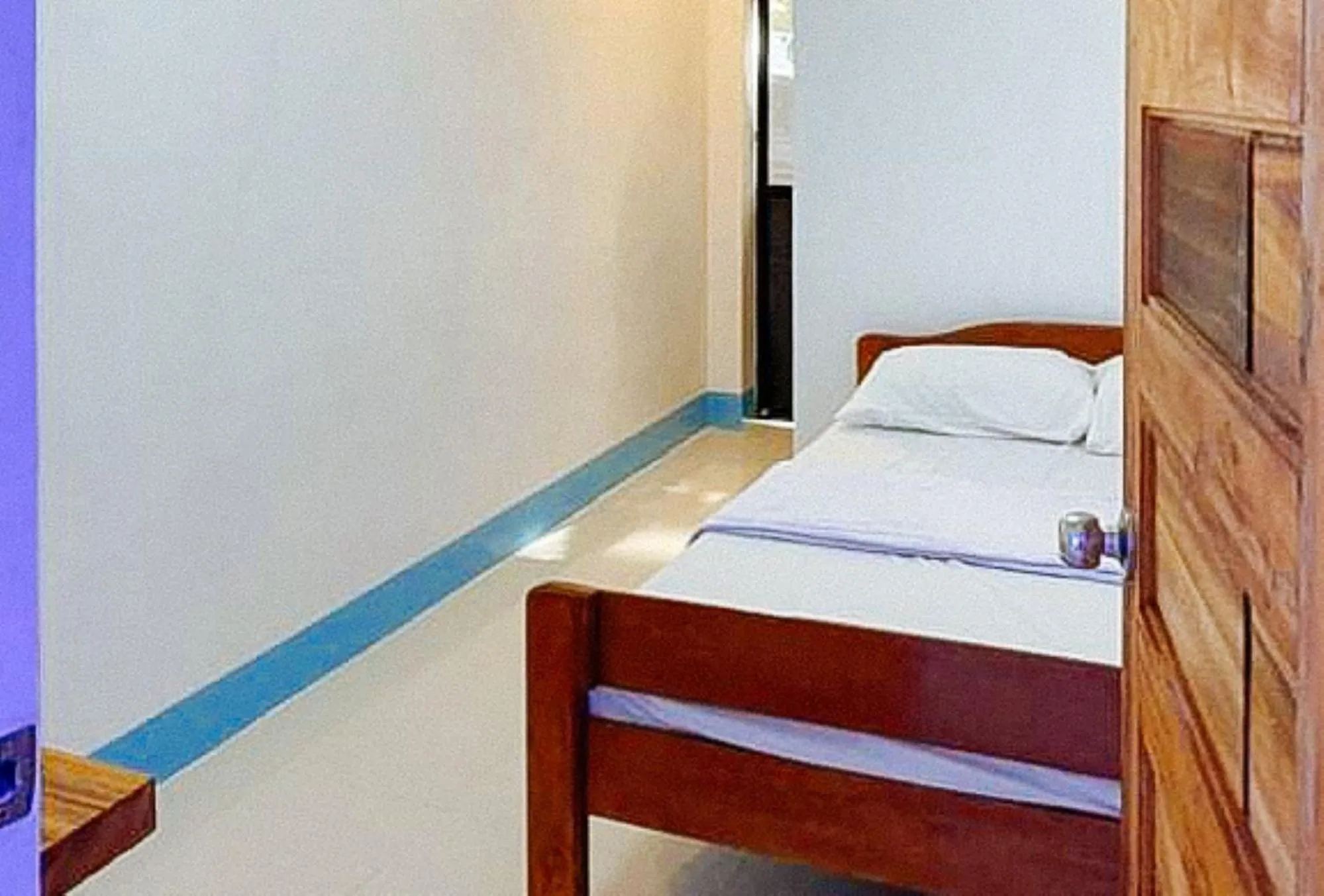 Photo of the whole room, Bed in RedDoorz @ SCJS INN Buug Sibugay