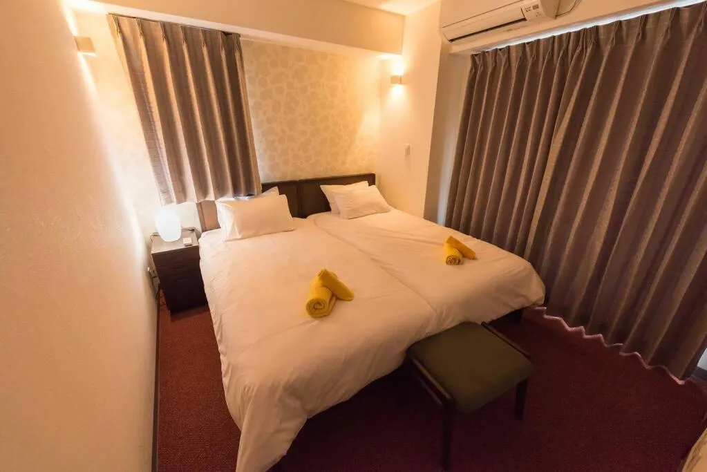 Bed in Serorin Light Hotel Tokyo