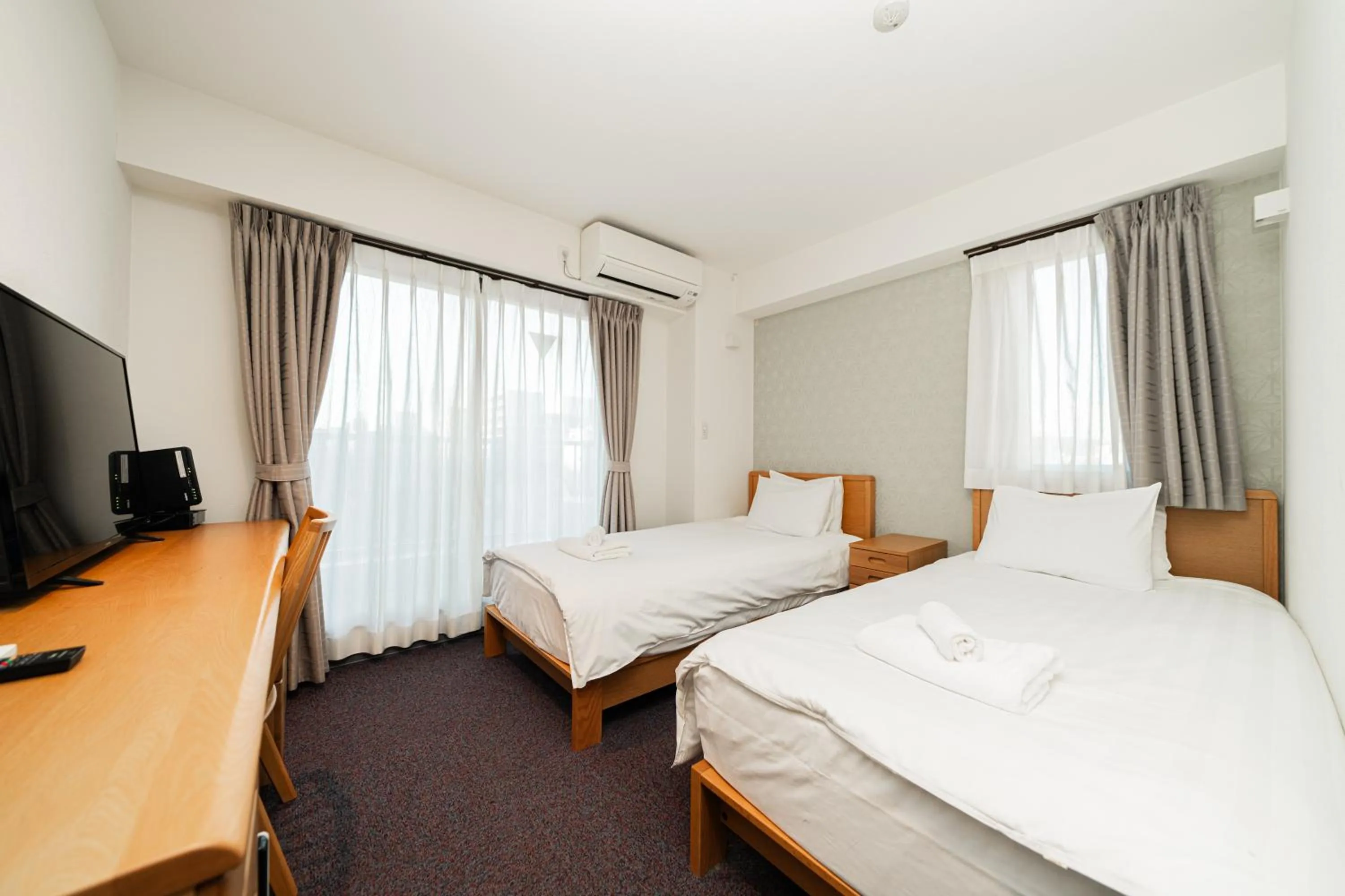 Bed in Serorin Light Hotel Tokyo