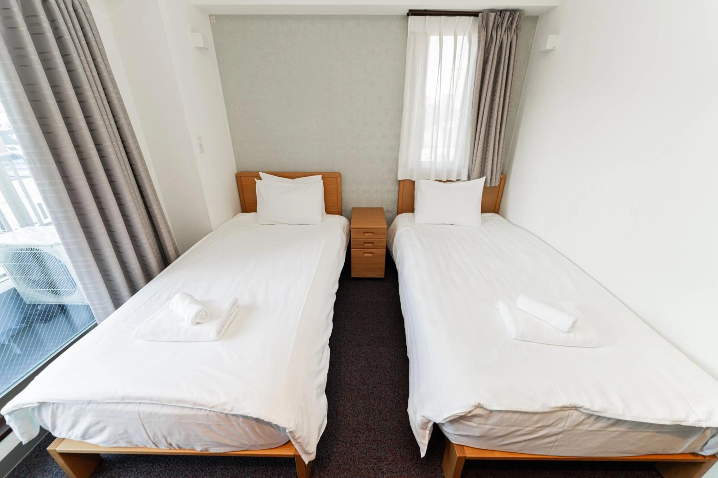 Bed in Serorin Light Hotel Tokyo