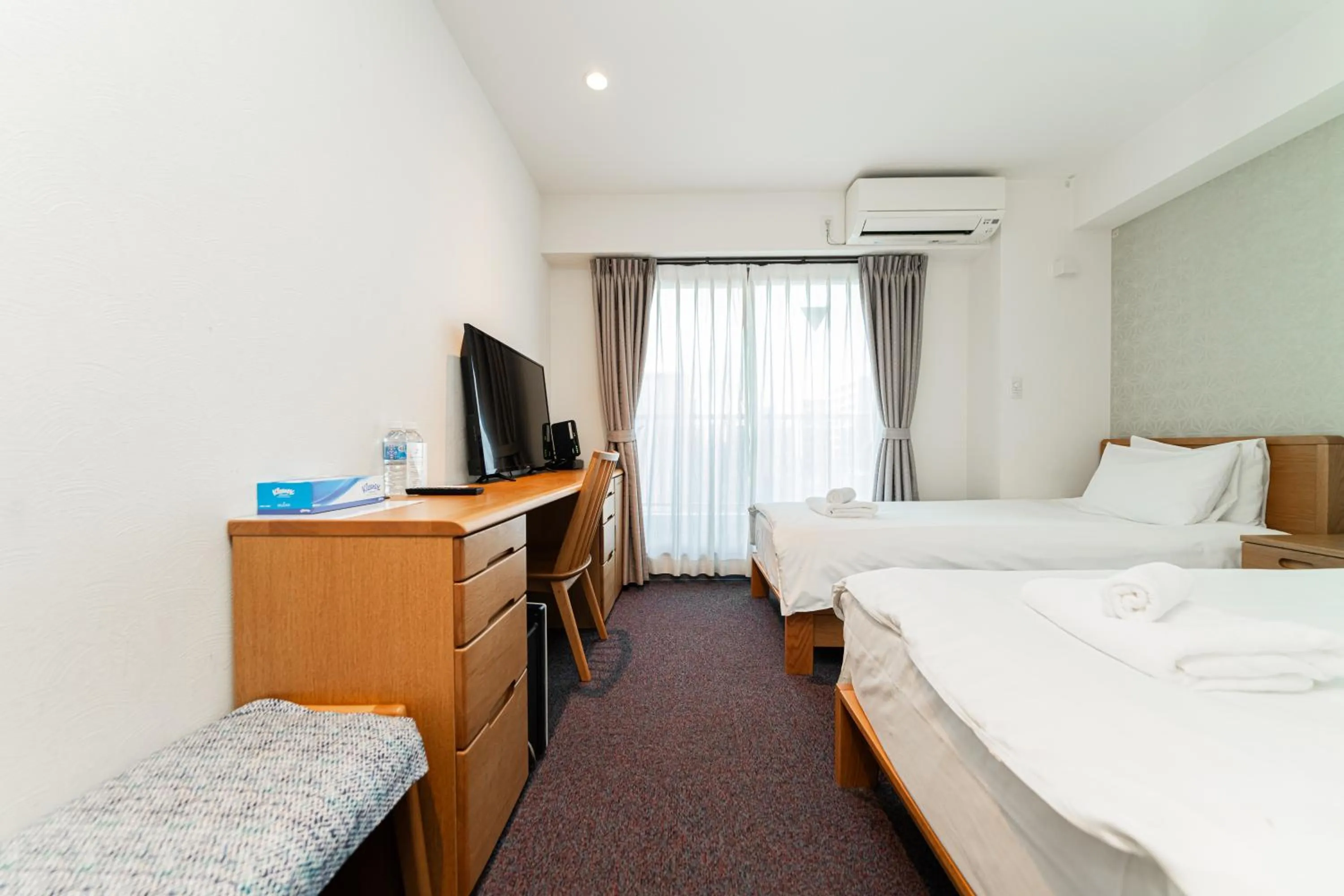 Bed in Serorin Light Hotel Tokyo