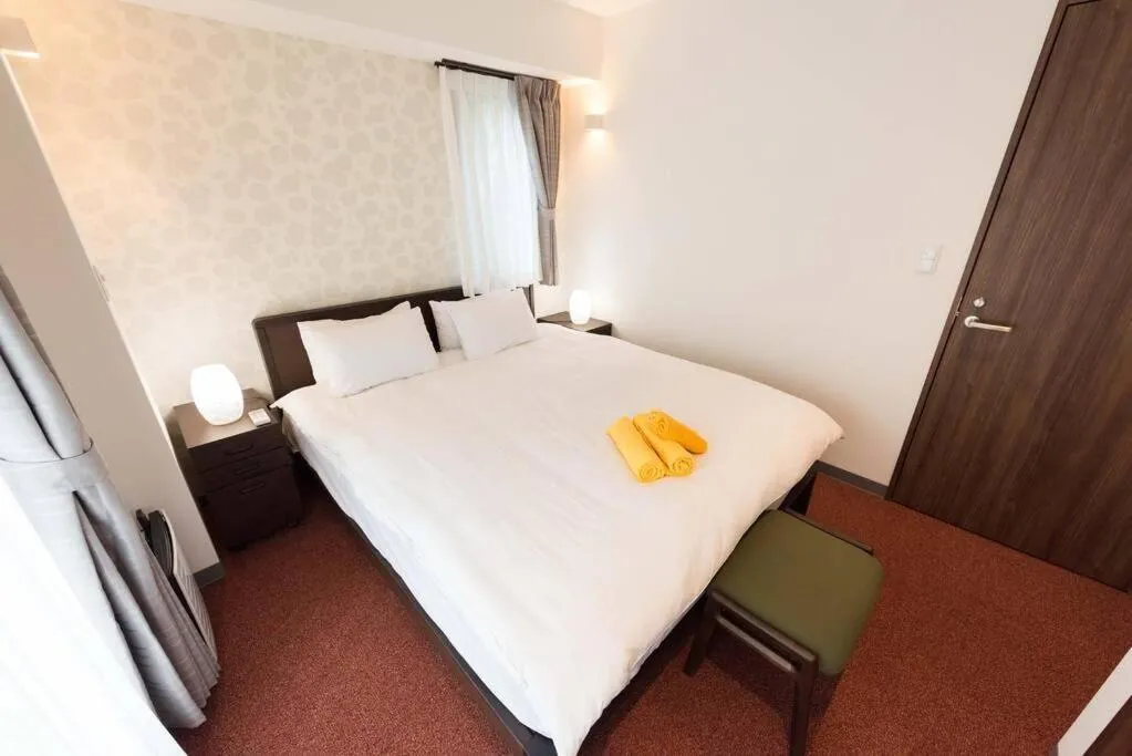 Bed in Serorin Light Hotel Tokyo