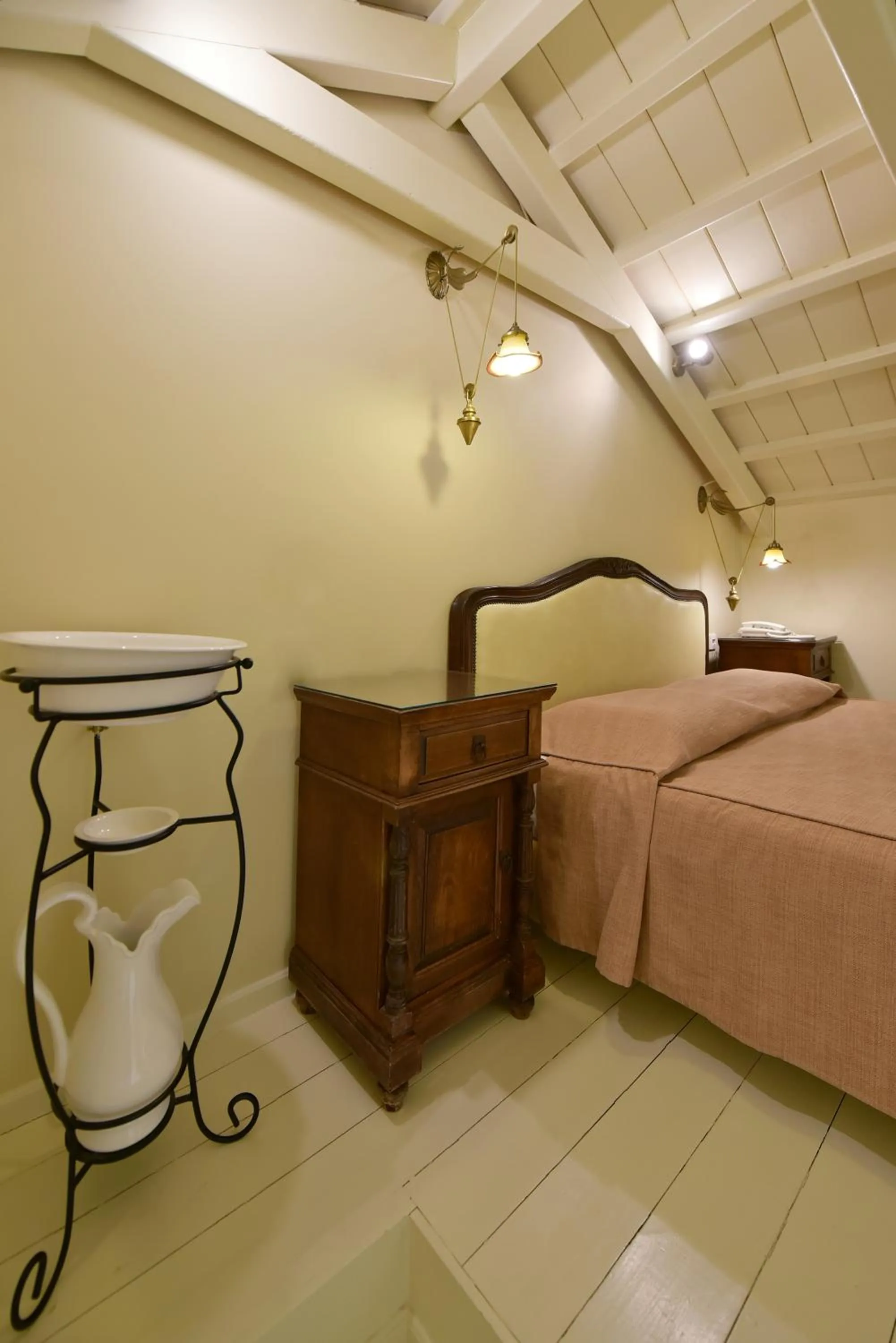 Bed in Angelica Traditional Boutique Hotel