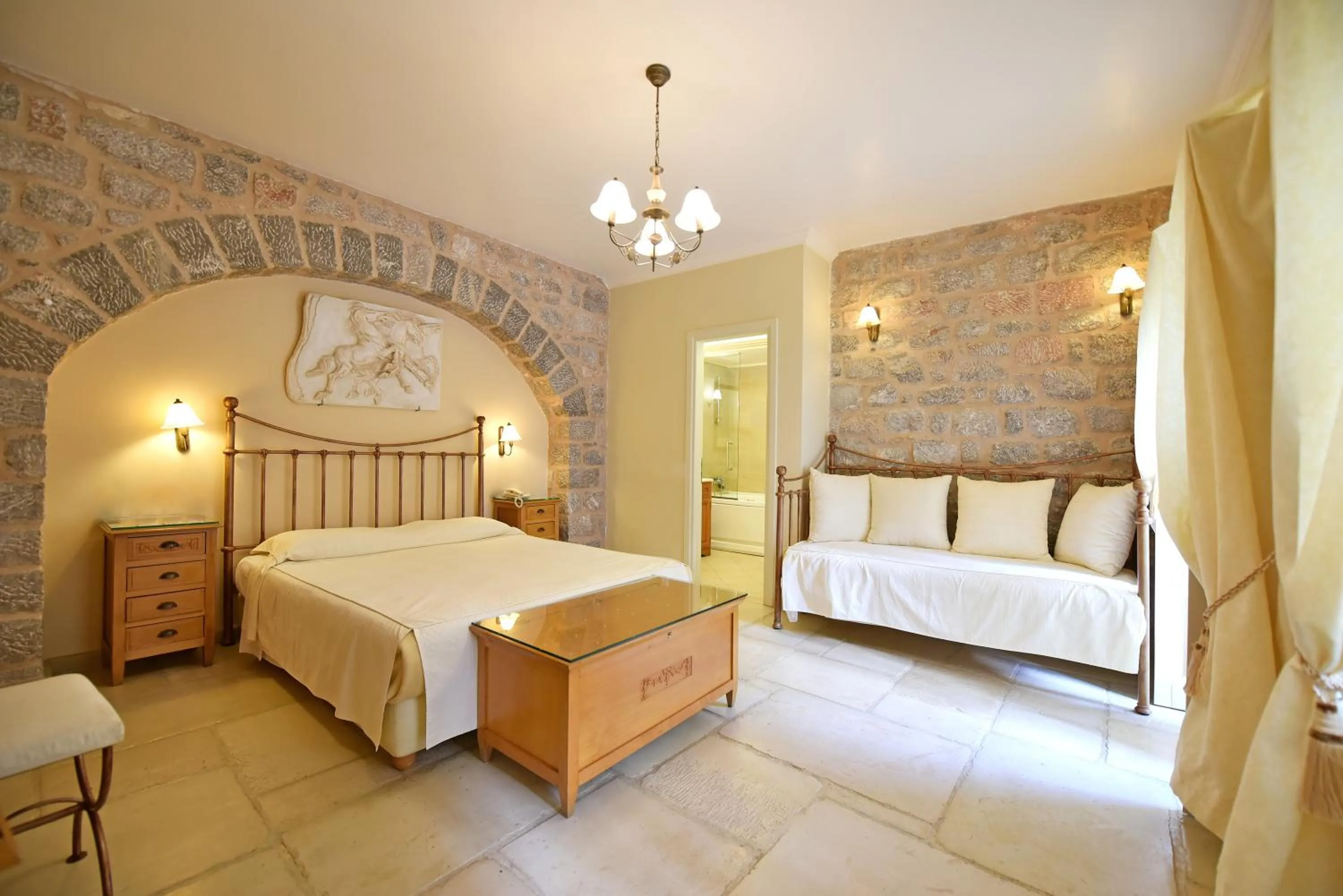 Bed in Angelica Traditional Boutique Hotel