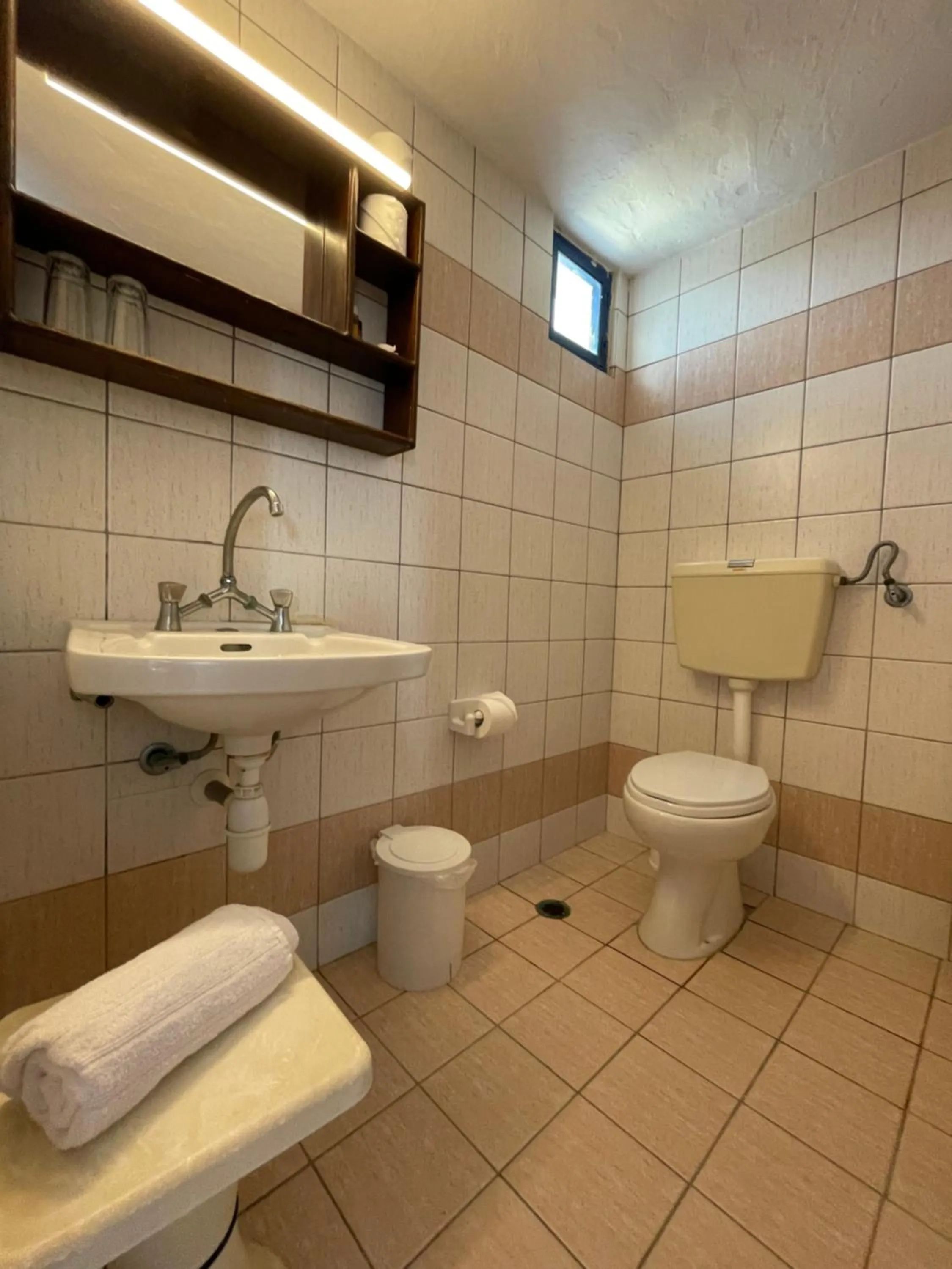 Shower in Arolithos Traditional Village Hotel