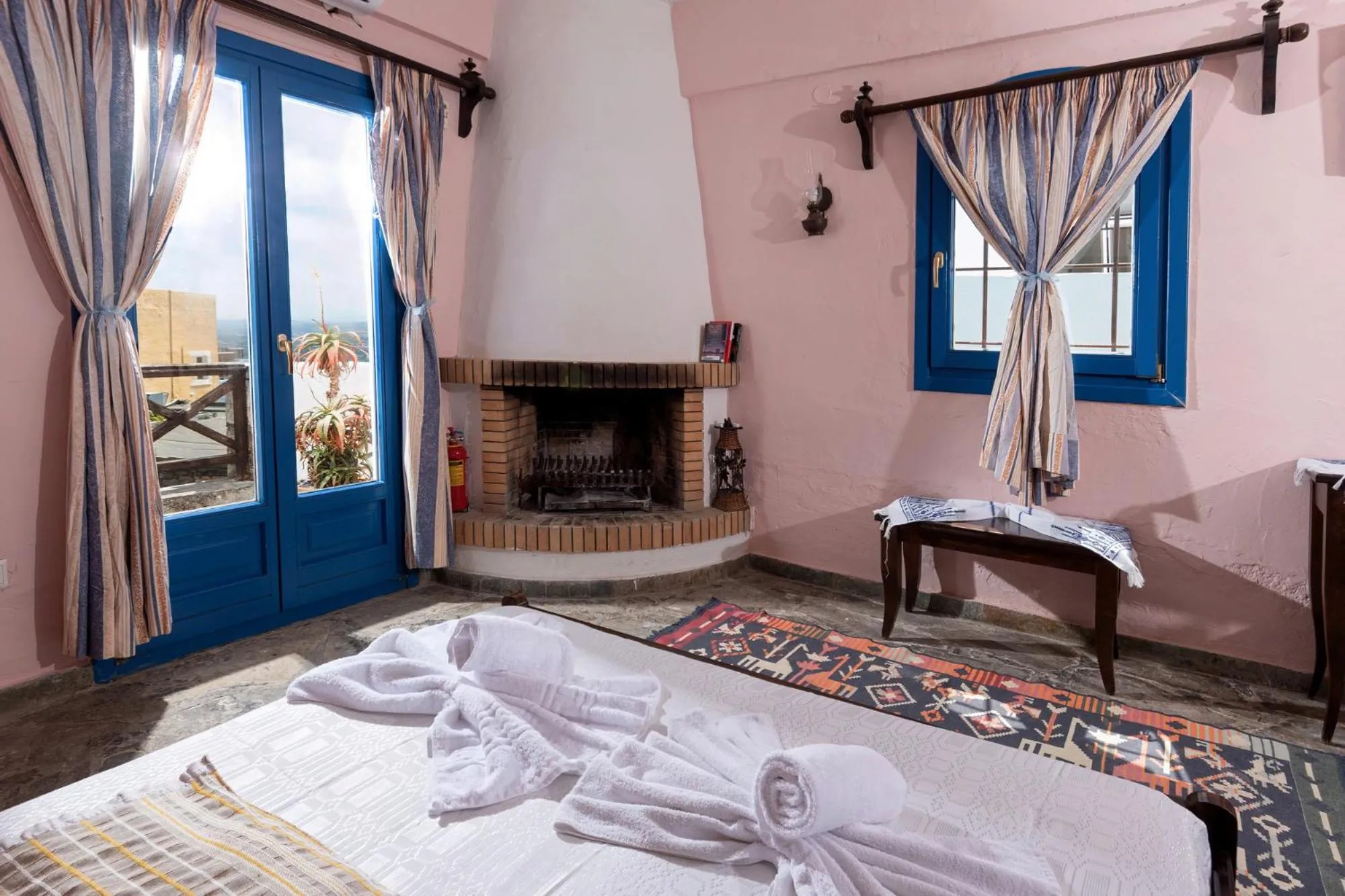 Bed in Arolithos Traditional Village Hotel