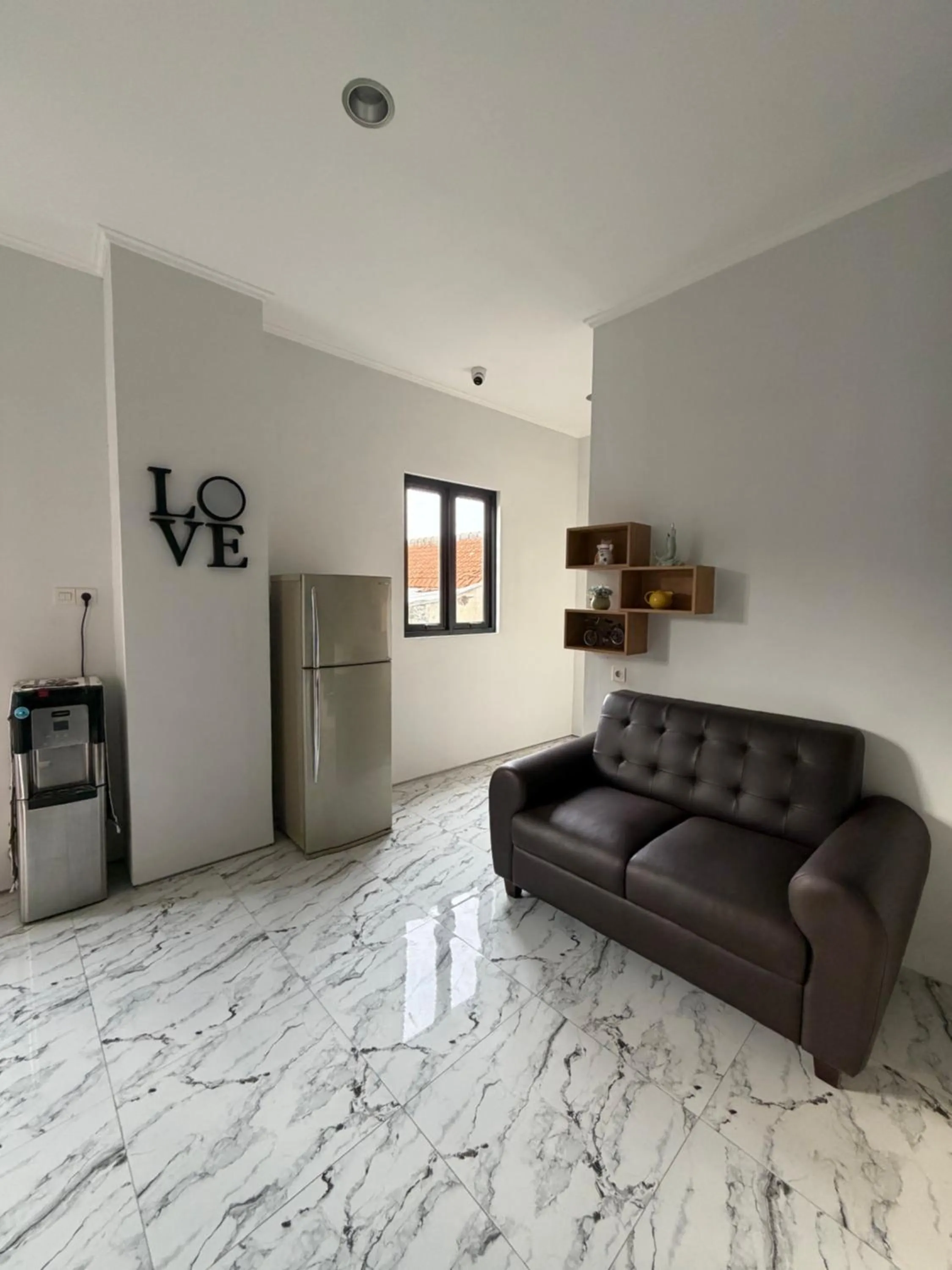 Seating area in Aurora House Surabaya