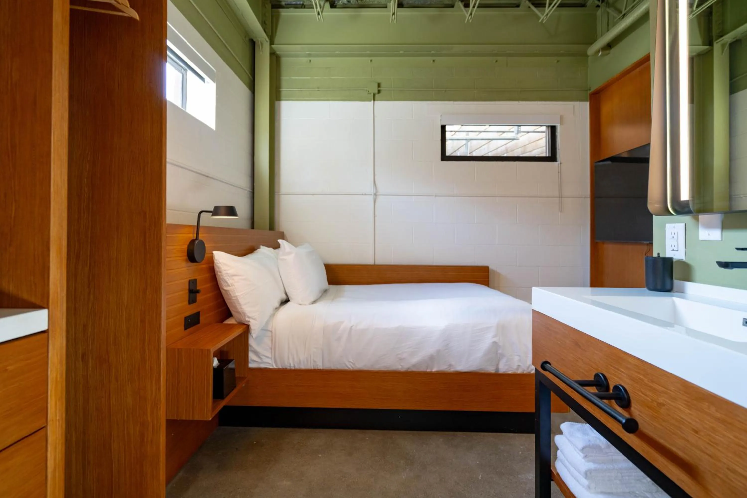 Bed in The Myriad Hotel Louisville, Tapestry Collection by Hilton