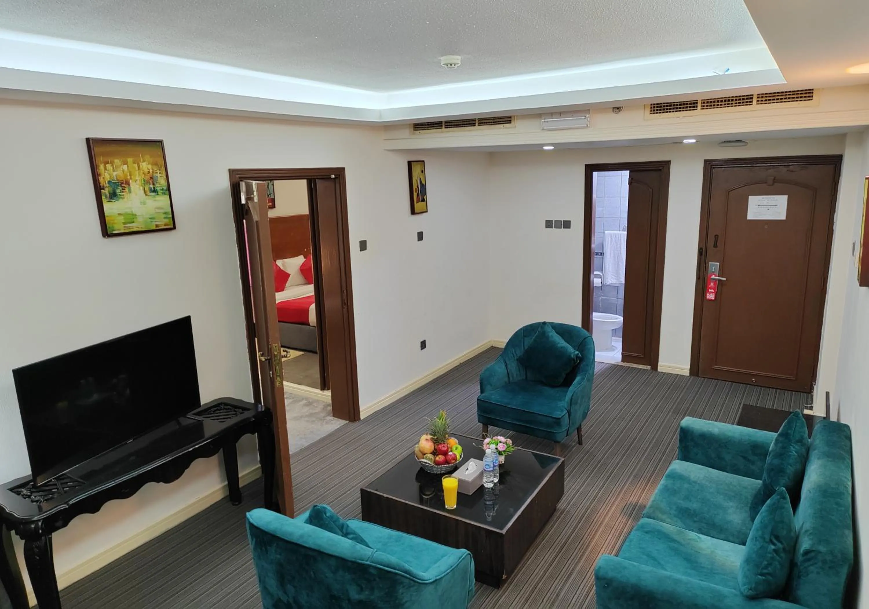 Communal lounge/ TV room in Le Paradise Palace Hotel Deira Dubai Al Rigga