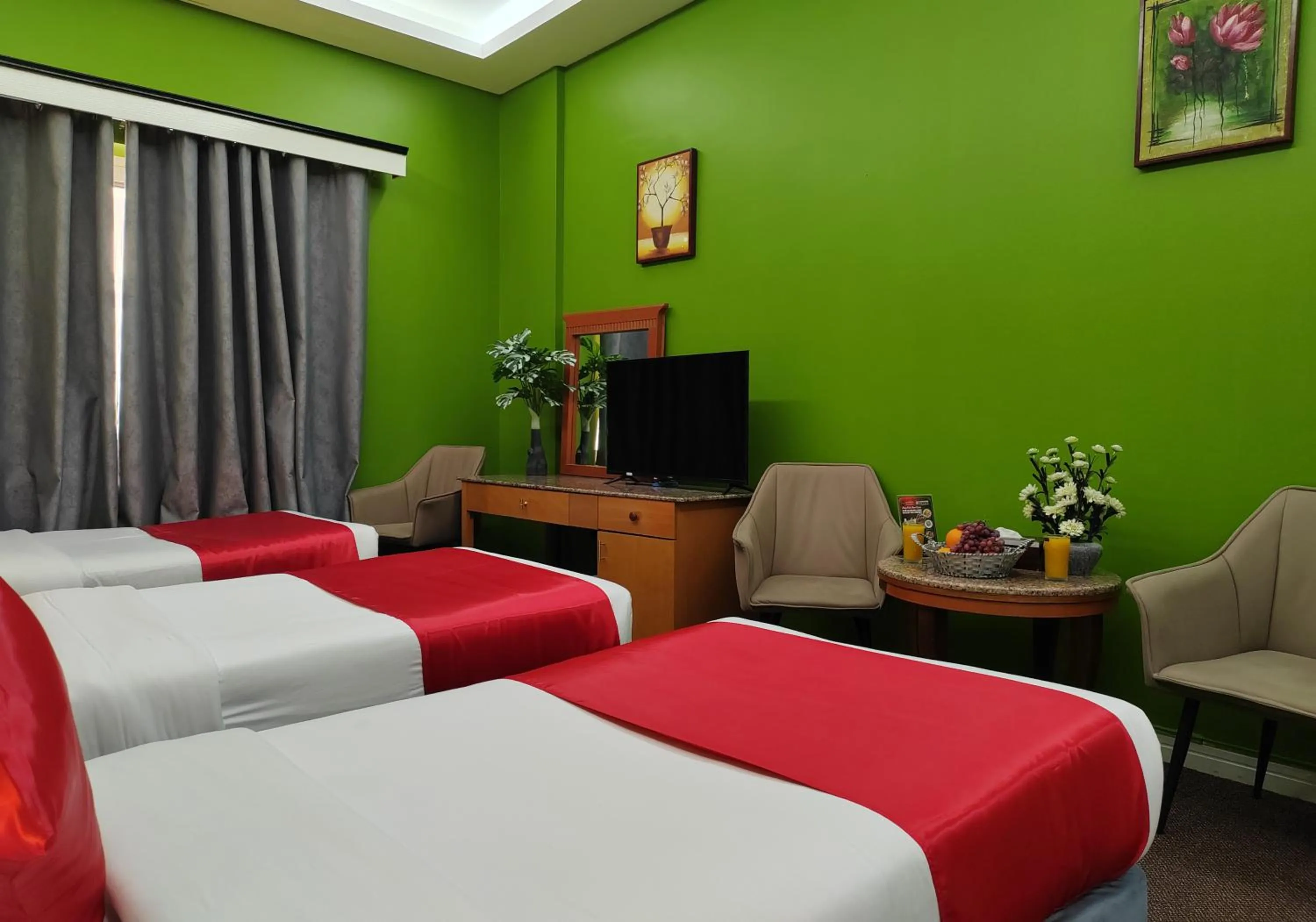 Communal lounge/ TV room in Le Paradise Palace Hotel Deira Dubai Al Rigga