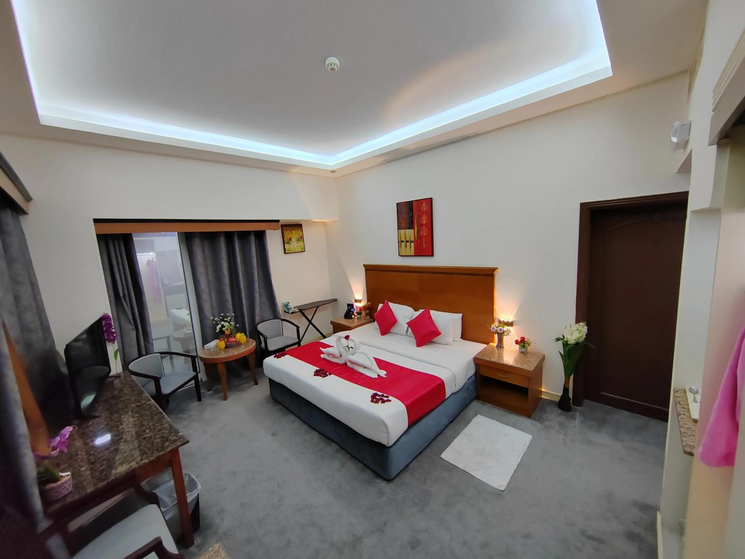 Communal lounge/ TV room, Bed in Le Paradise Palace Hotel Deira Dubai Al Rigga