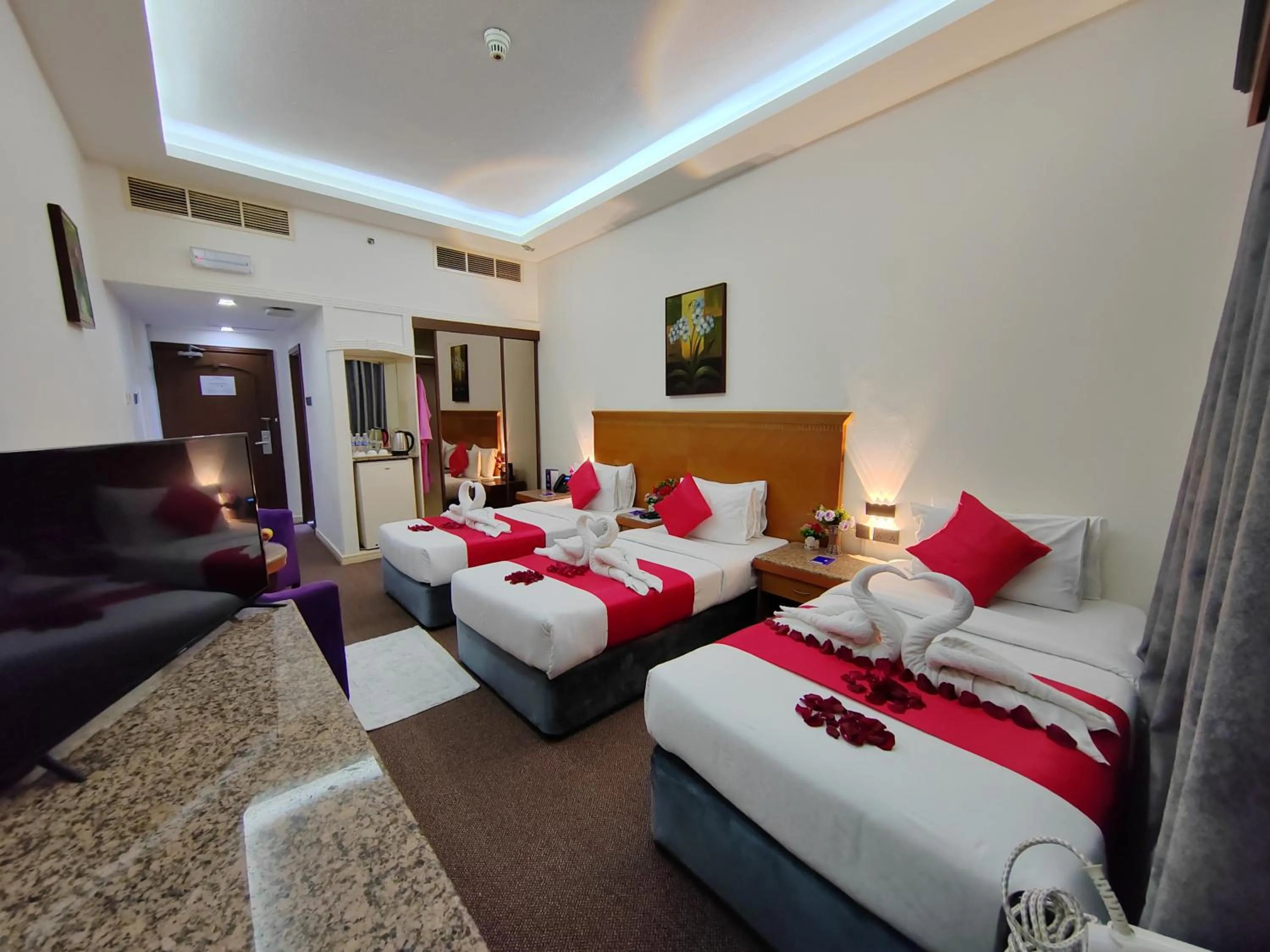 Communal lounge/ TV room, Bed in Le Paradise Palace Hotel Deira Dubai Al Rigga