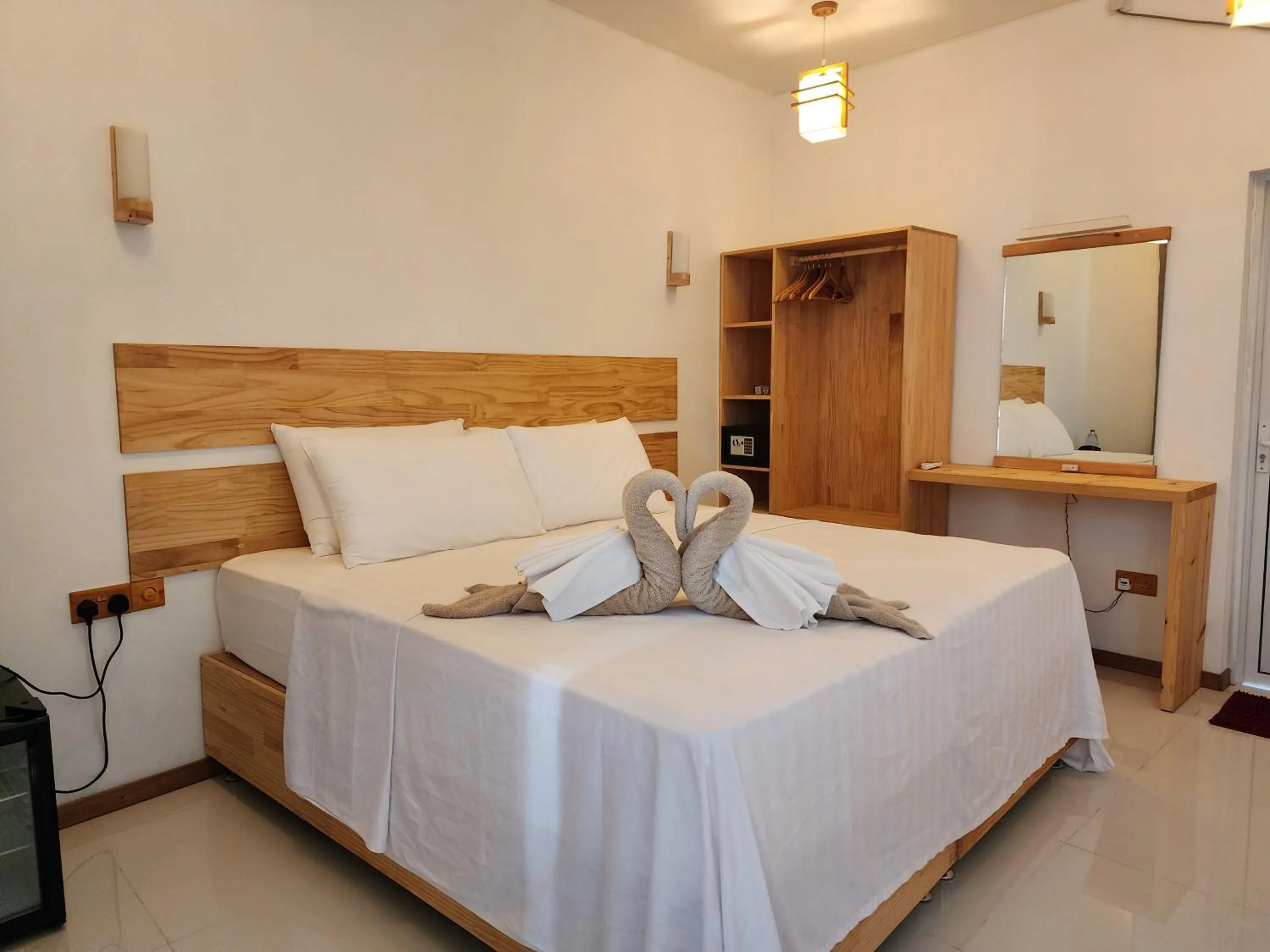 Photo of the whole room, Bed in Dhigurah Dhonveli Boutique