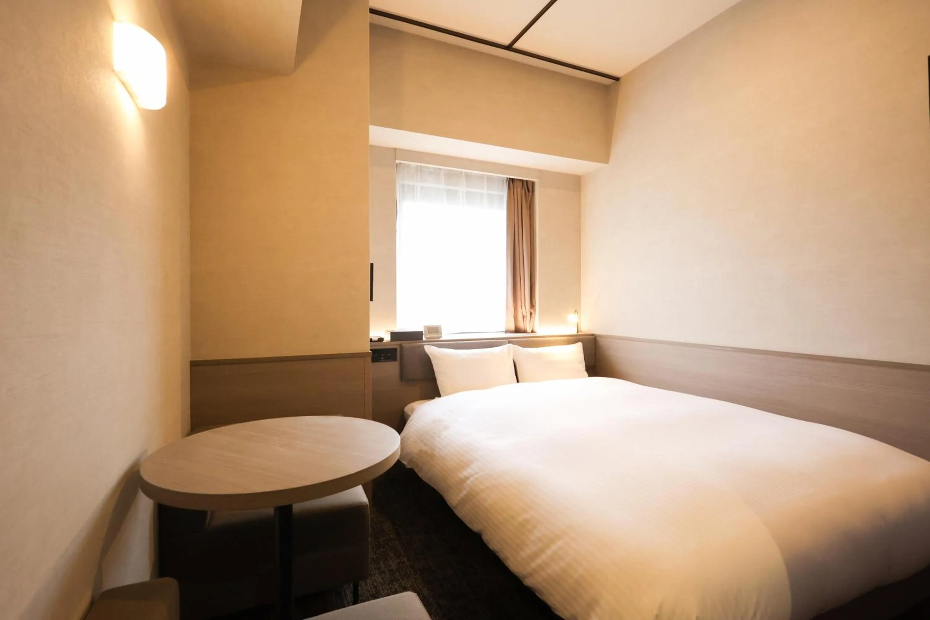 Bed in SK HOTEL Kobe Ekimae