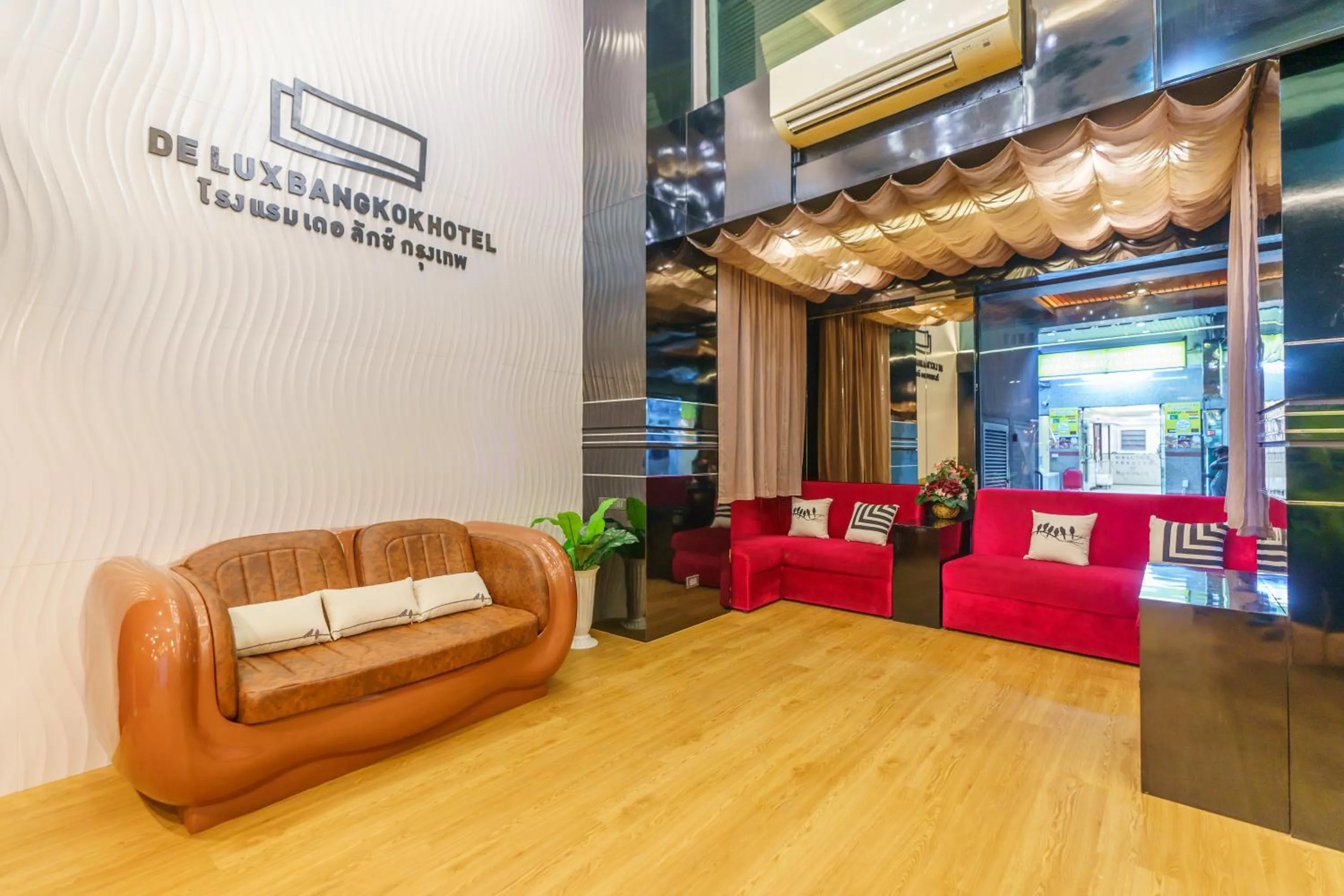 Lobby or reception in De Lux Bangkok Hotel