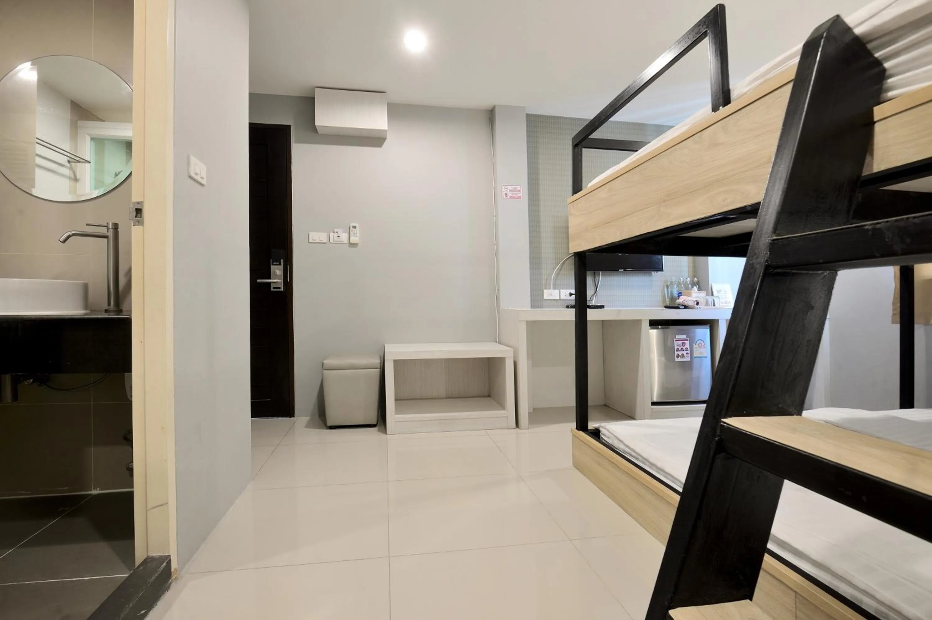 Bed in De Lux Bangkok Hotel