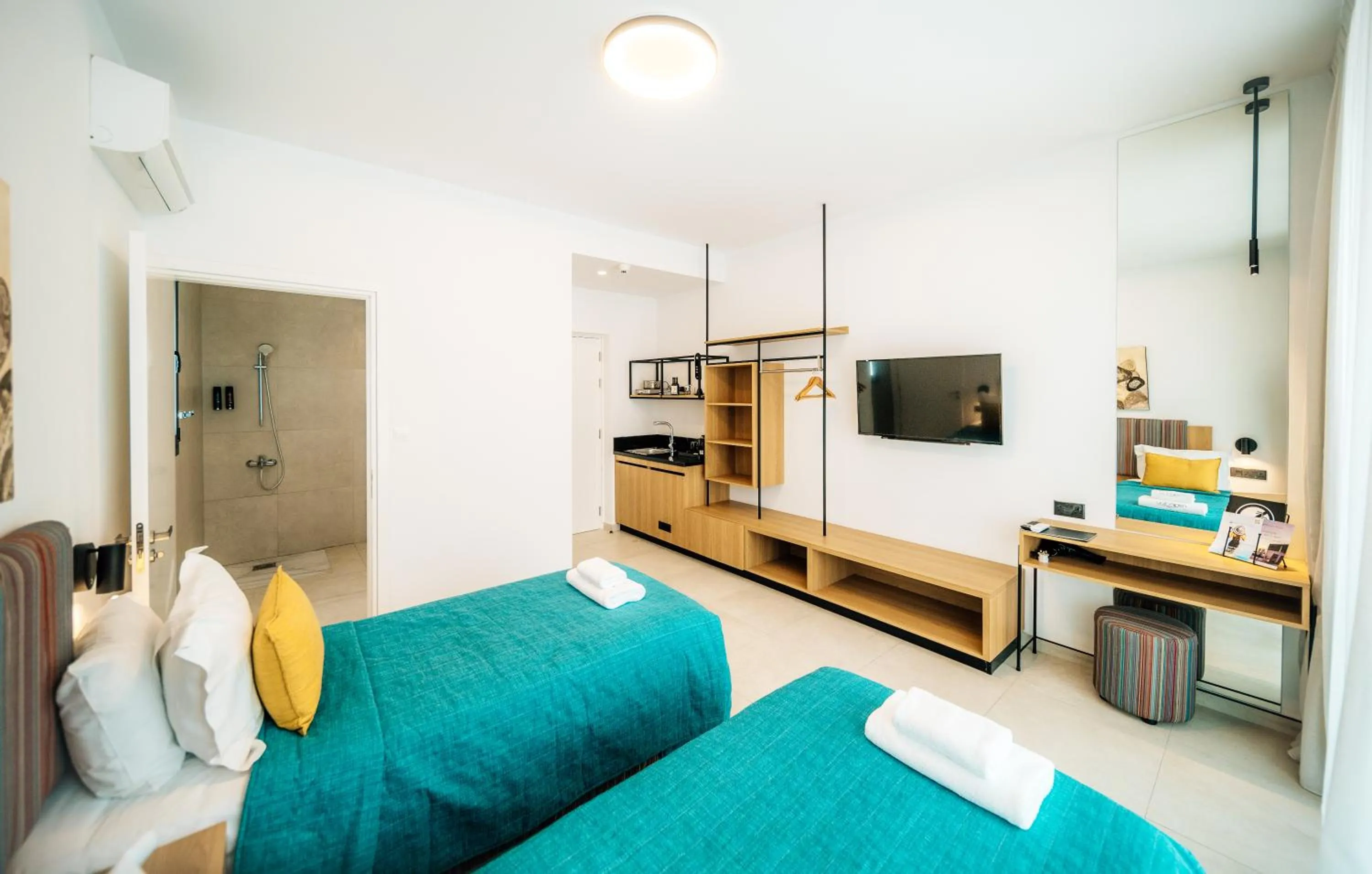 Bed in Regency Boutique Hotel Holiday Suites