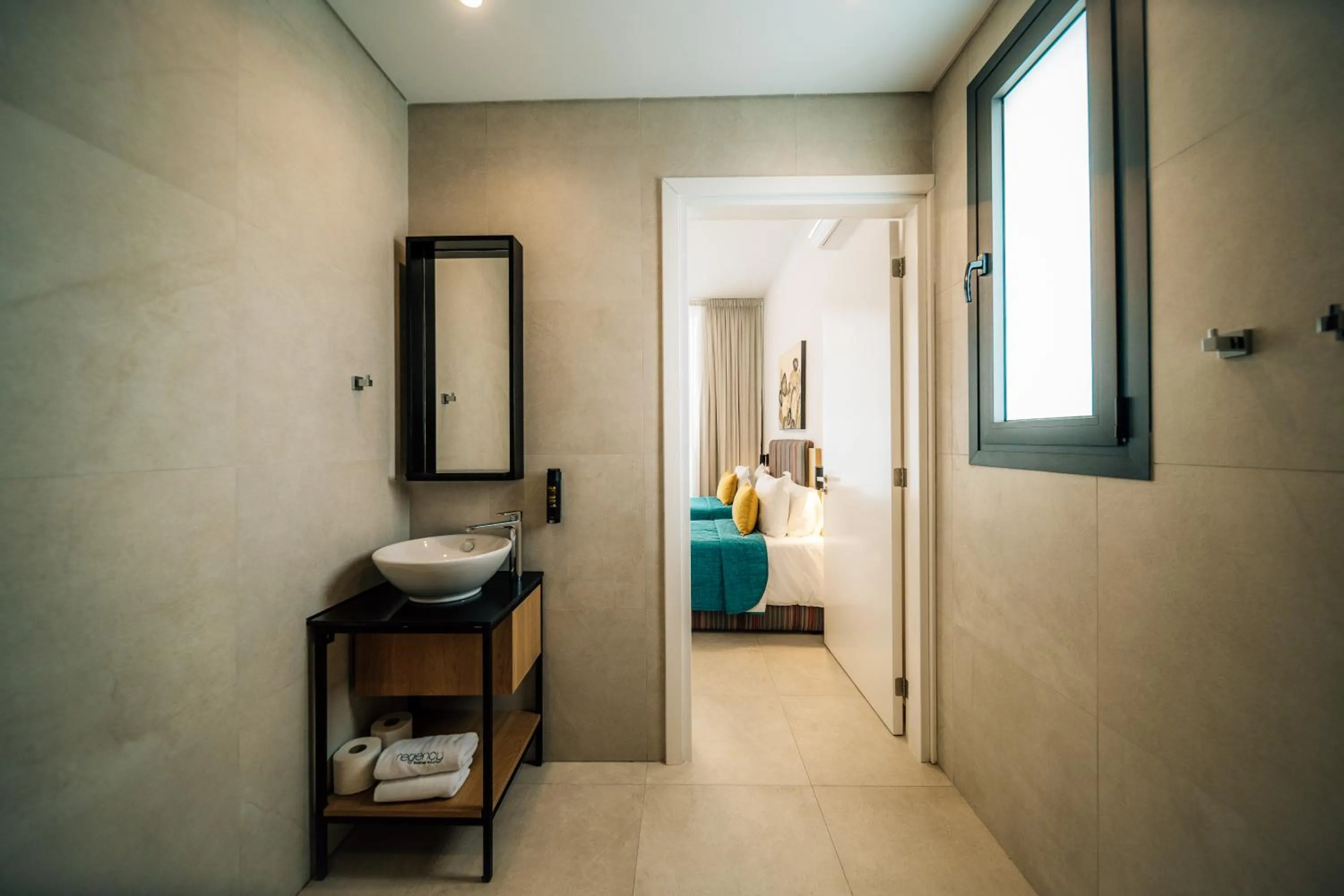 Bathroom in Regency Boutique Hotel Holiday Suites