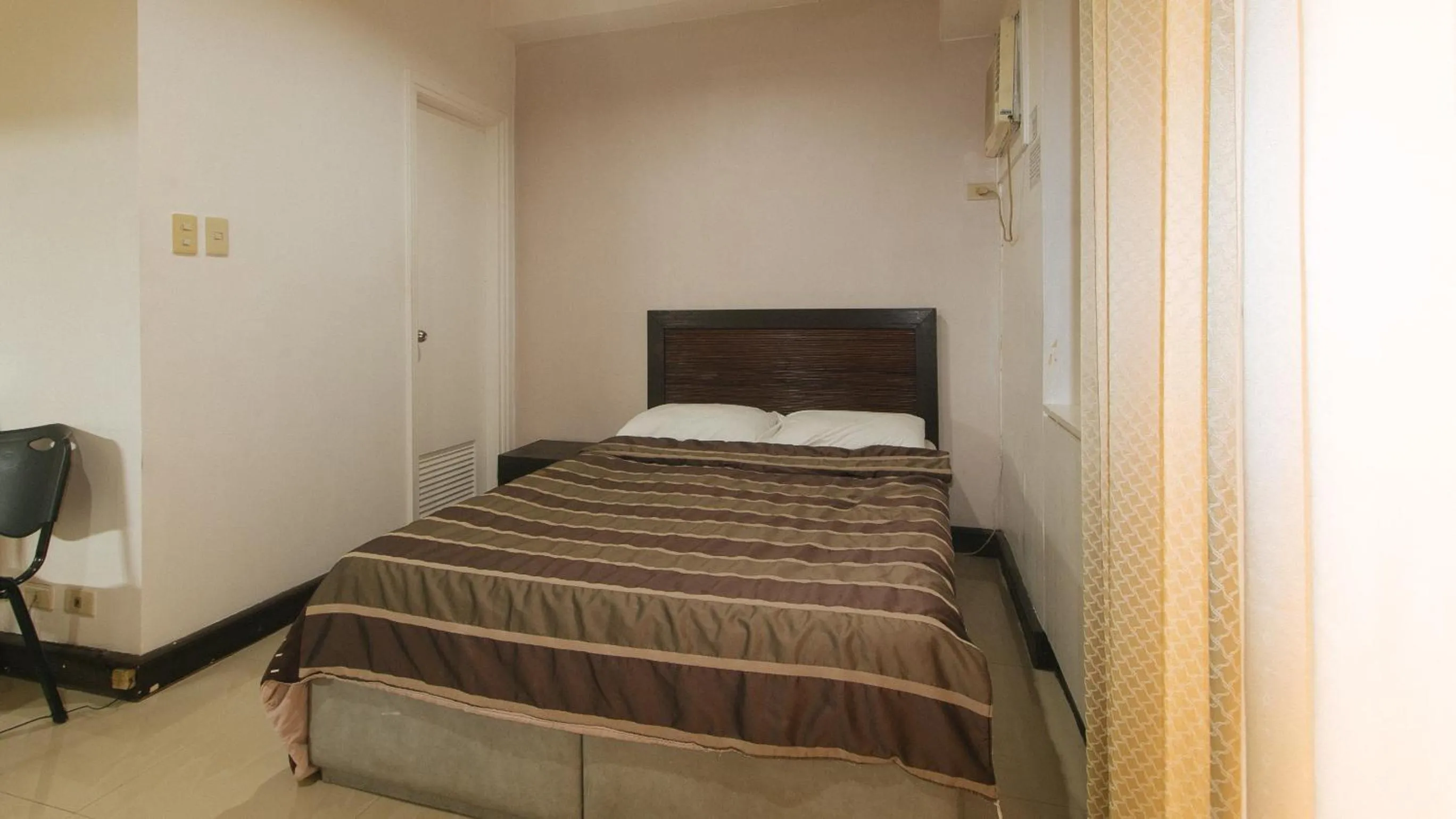 Bed in Sunette Tower Makati