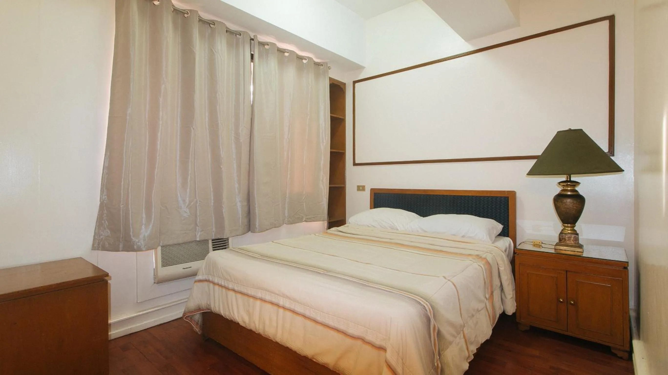 Photo of the whole room, Bed in Sunette Tower Makati