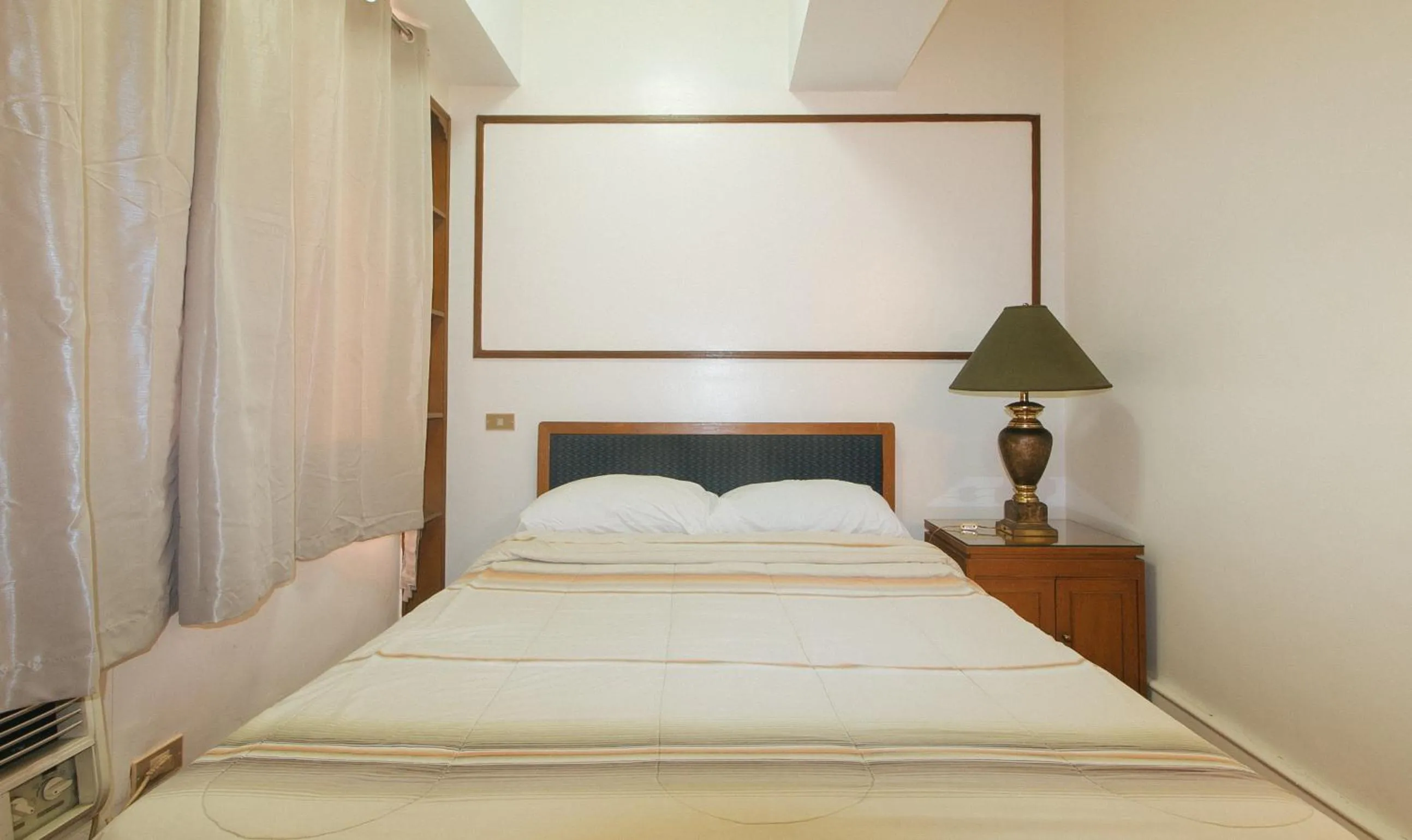 Bed in Sunette Tower Makati