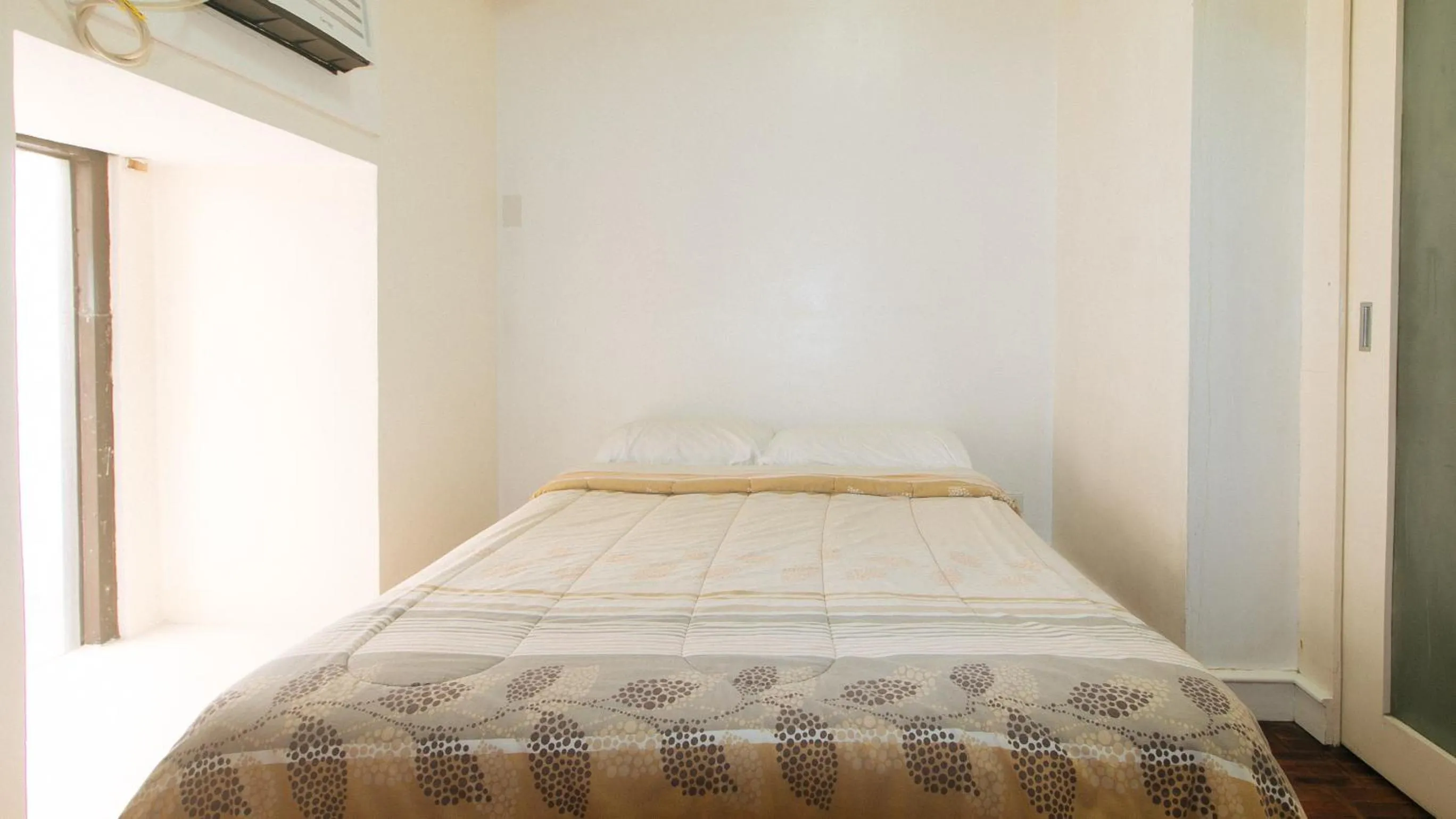 Bed in Sunette Tower Makati