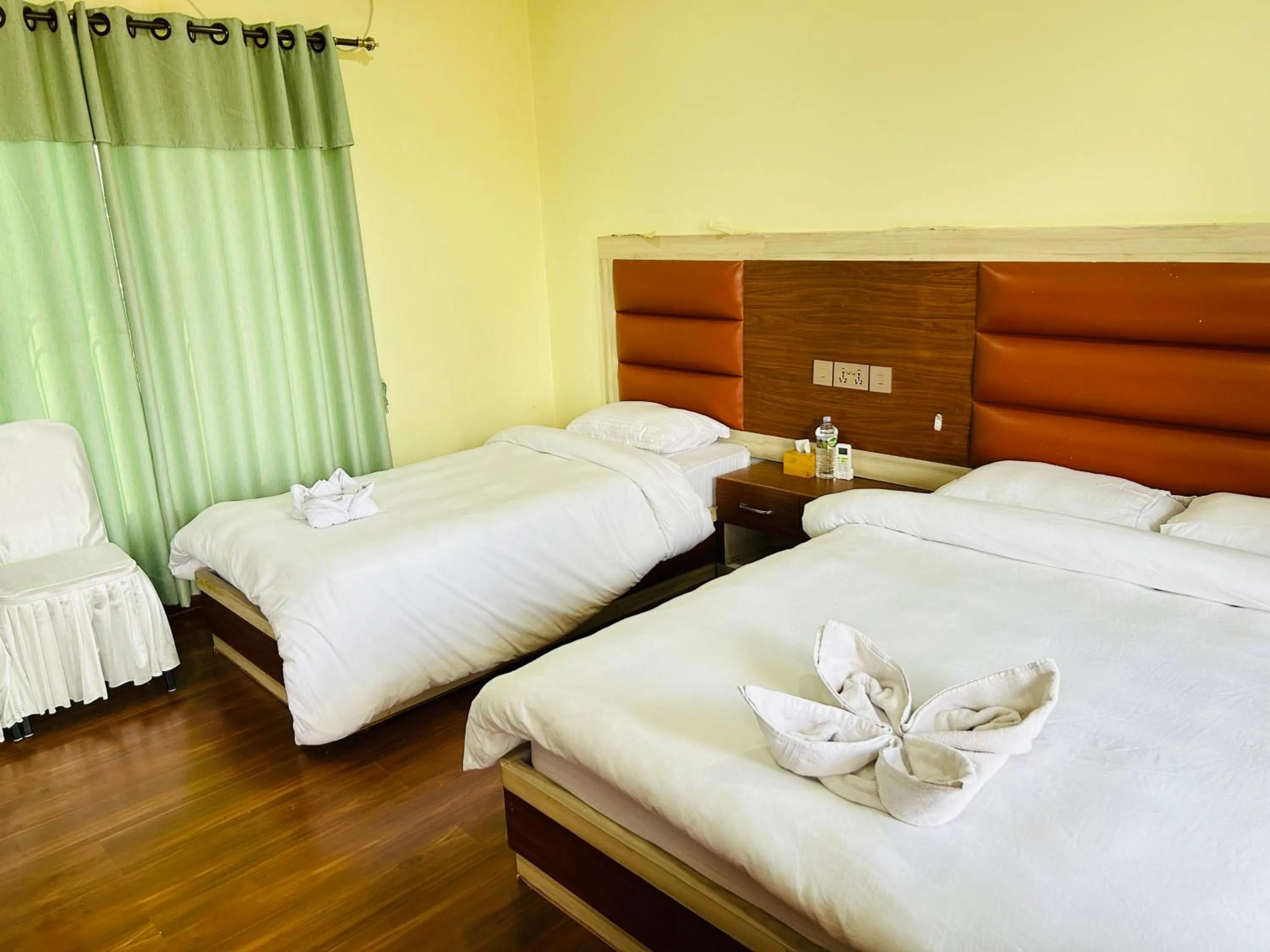 Bed in Tiger Wildlife Resort