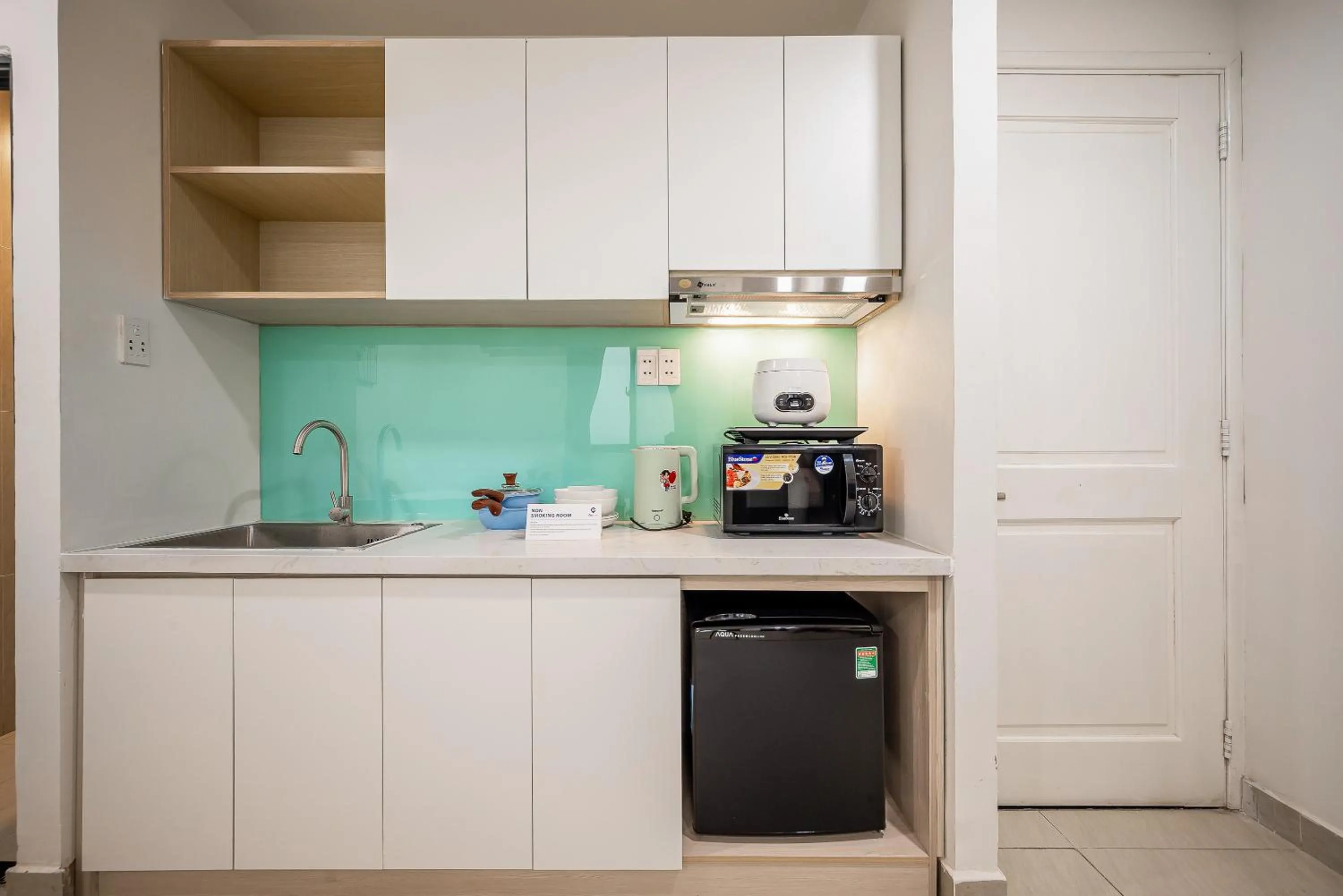 Kitchen or kitchenette in Cozrum Homes - Coraline House