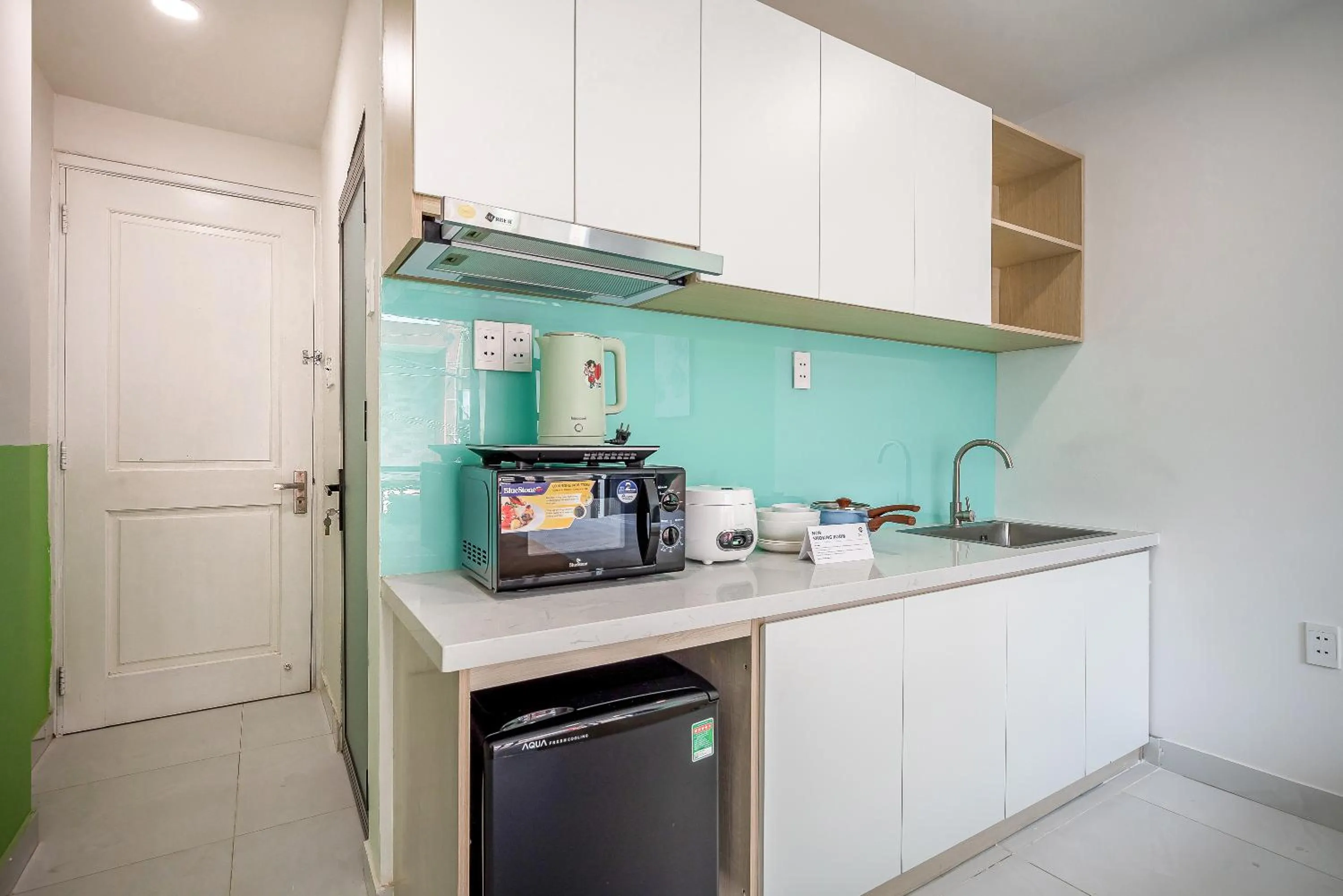 Kitchen or kitchenette in Cozrum Homes - Coraline House