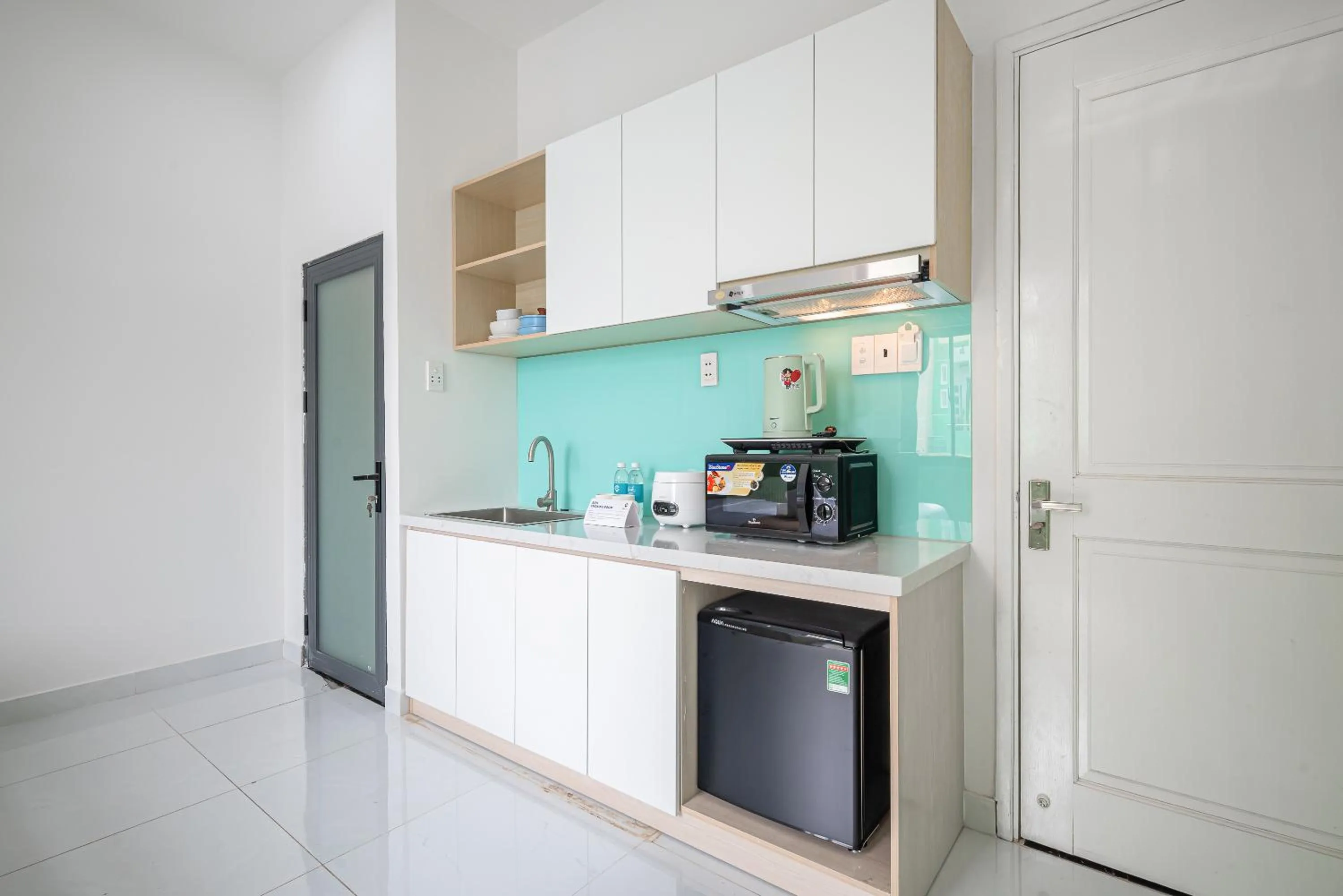 Kitchen or kitchenette in Cozrum Homes - Coraline House